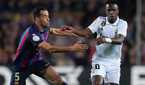 Sergio Busquets and Vinicius Jr during Barcelona vs Real Madrid.