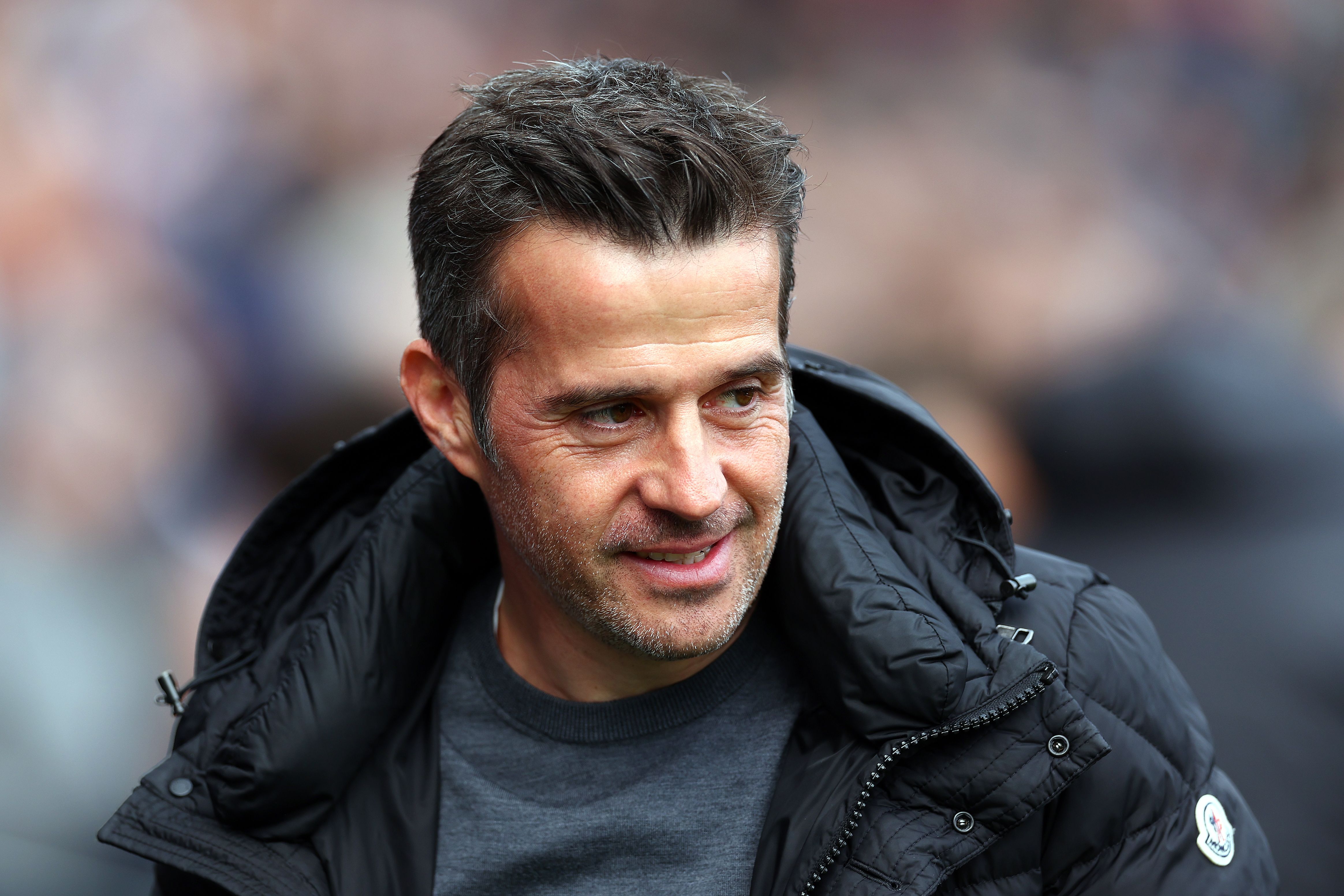 Marco Silva, Manager of Fulham, walks to the dugouts for the Premier League