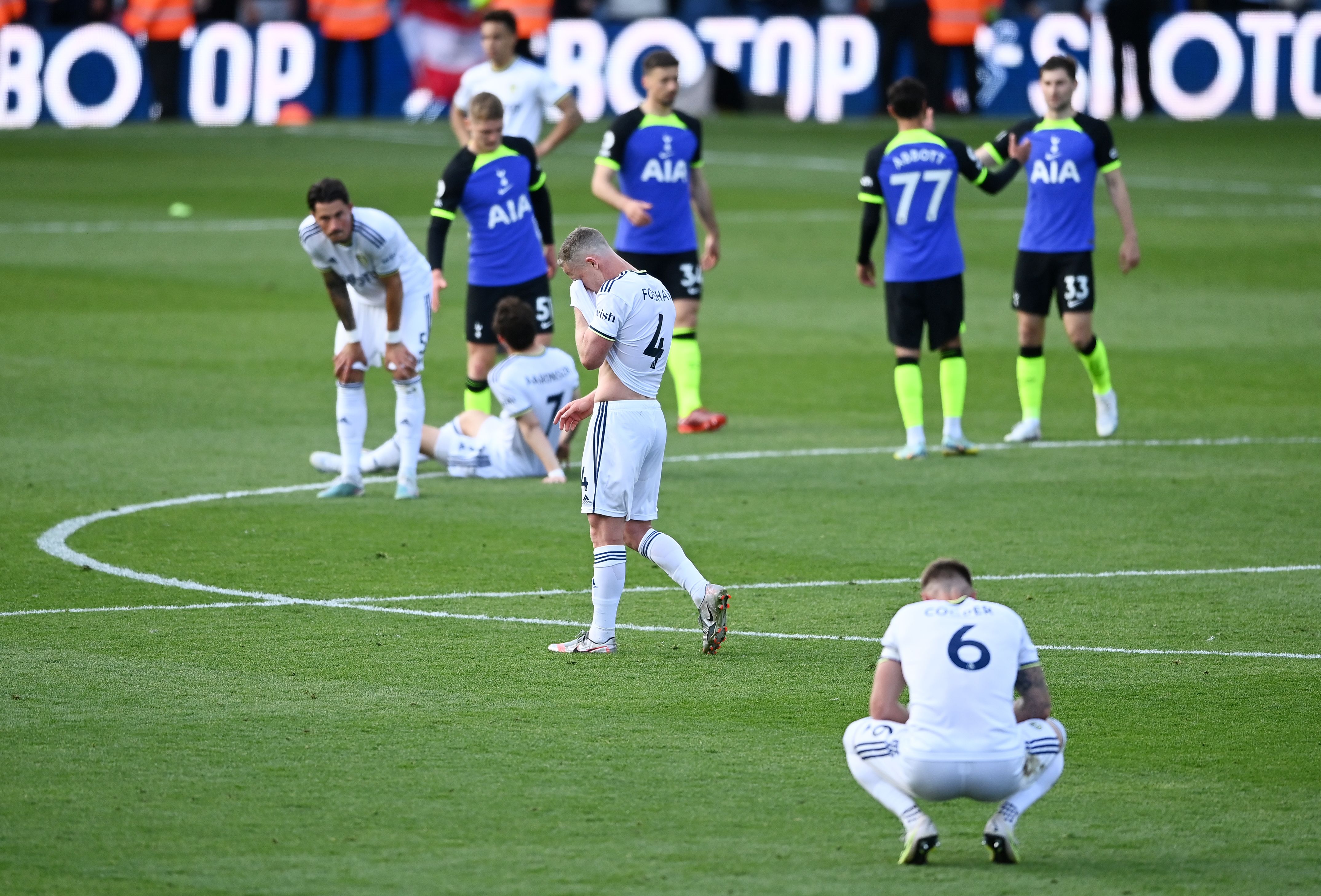Leeds United players after being relegated to the Championship by Tottenham.