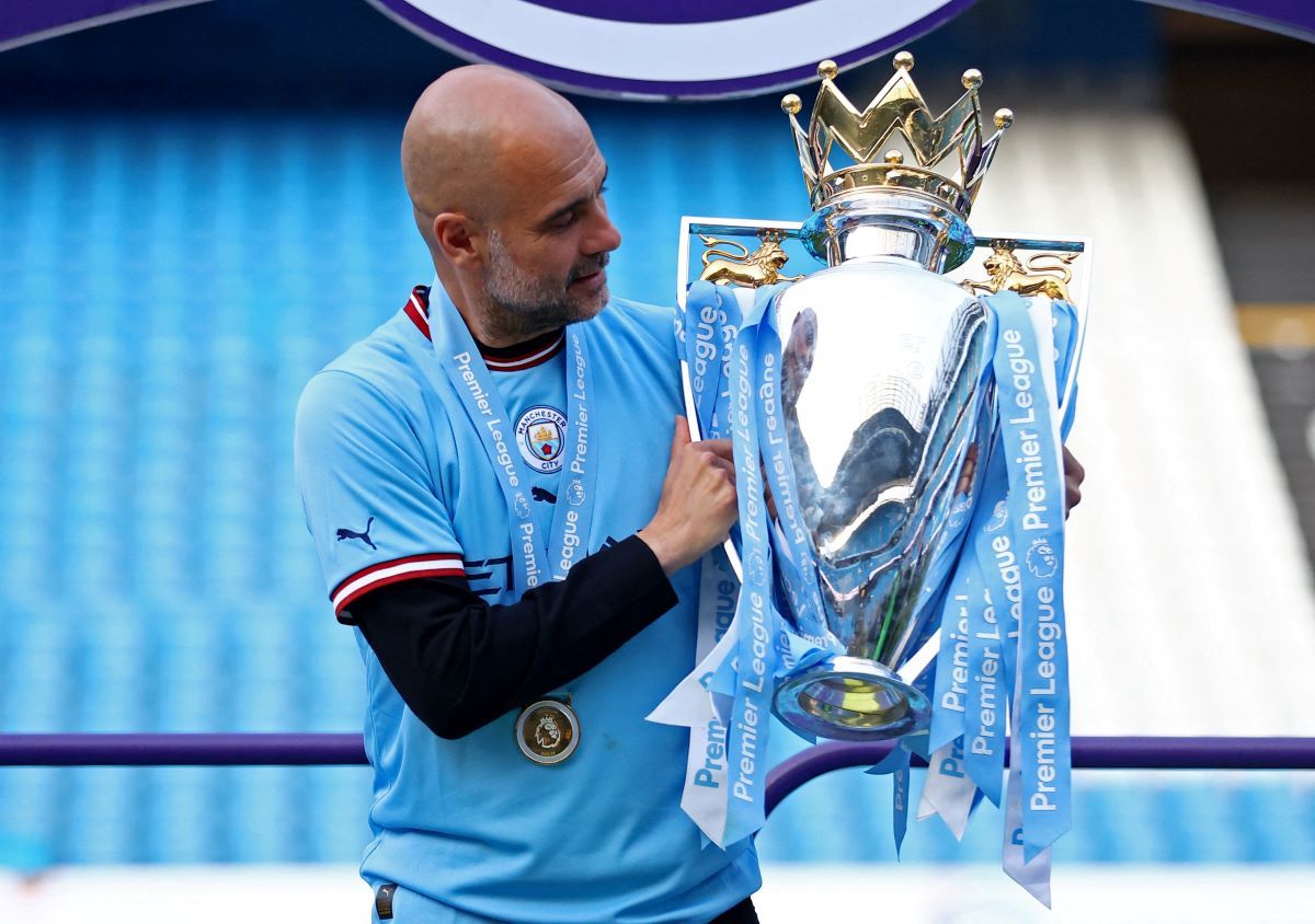 Pep Guardiola lifts Premier League trophy with Manchester City