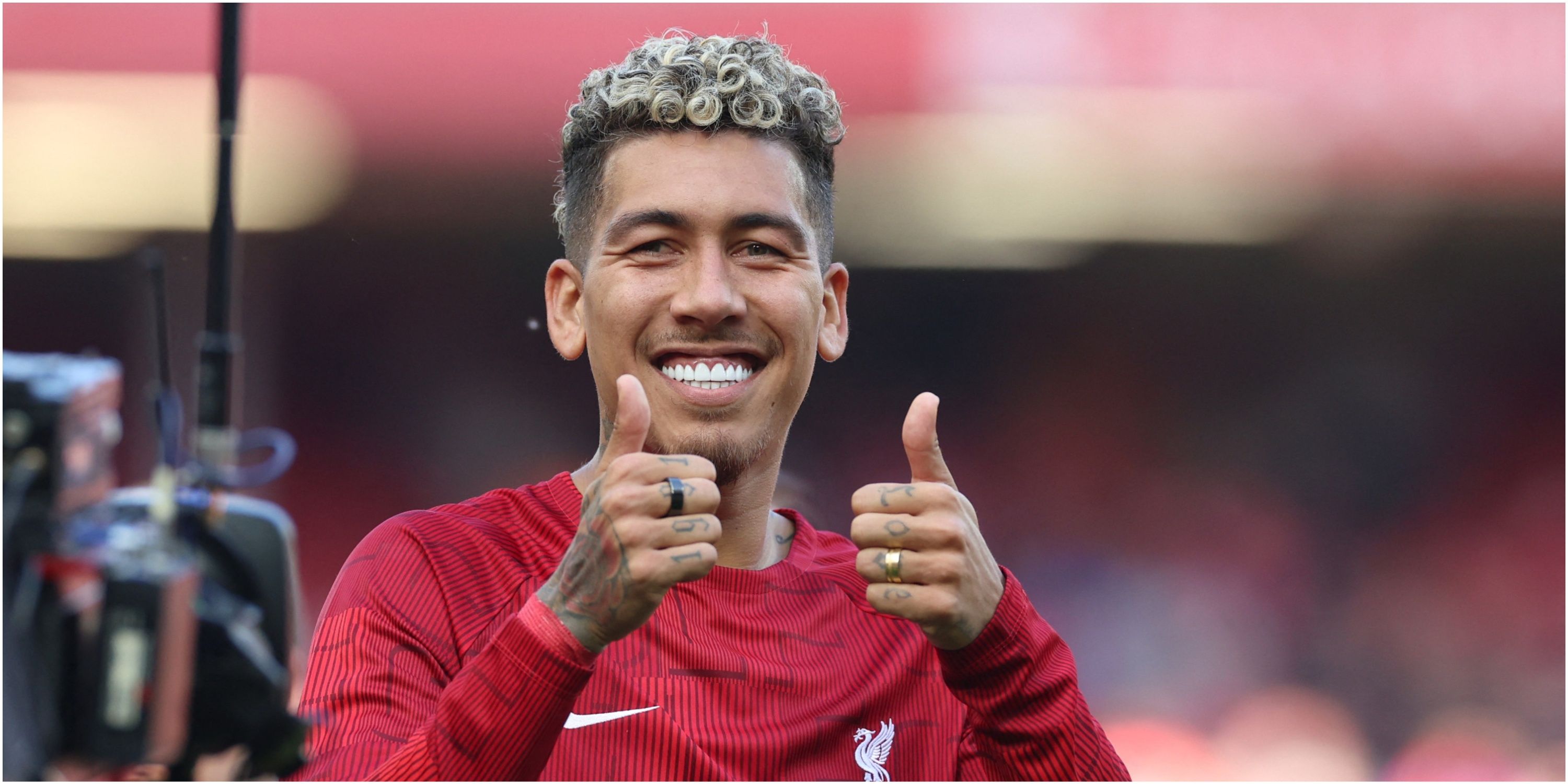 Roberto Firmino gives a thumbs up to the fans on his last appearance for Liverpool at Anfield