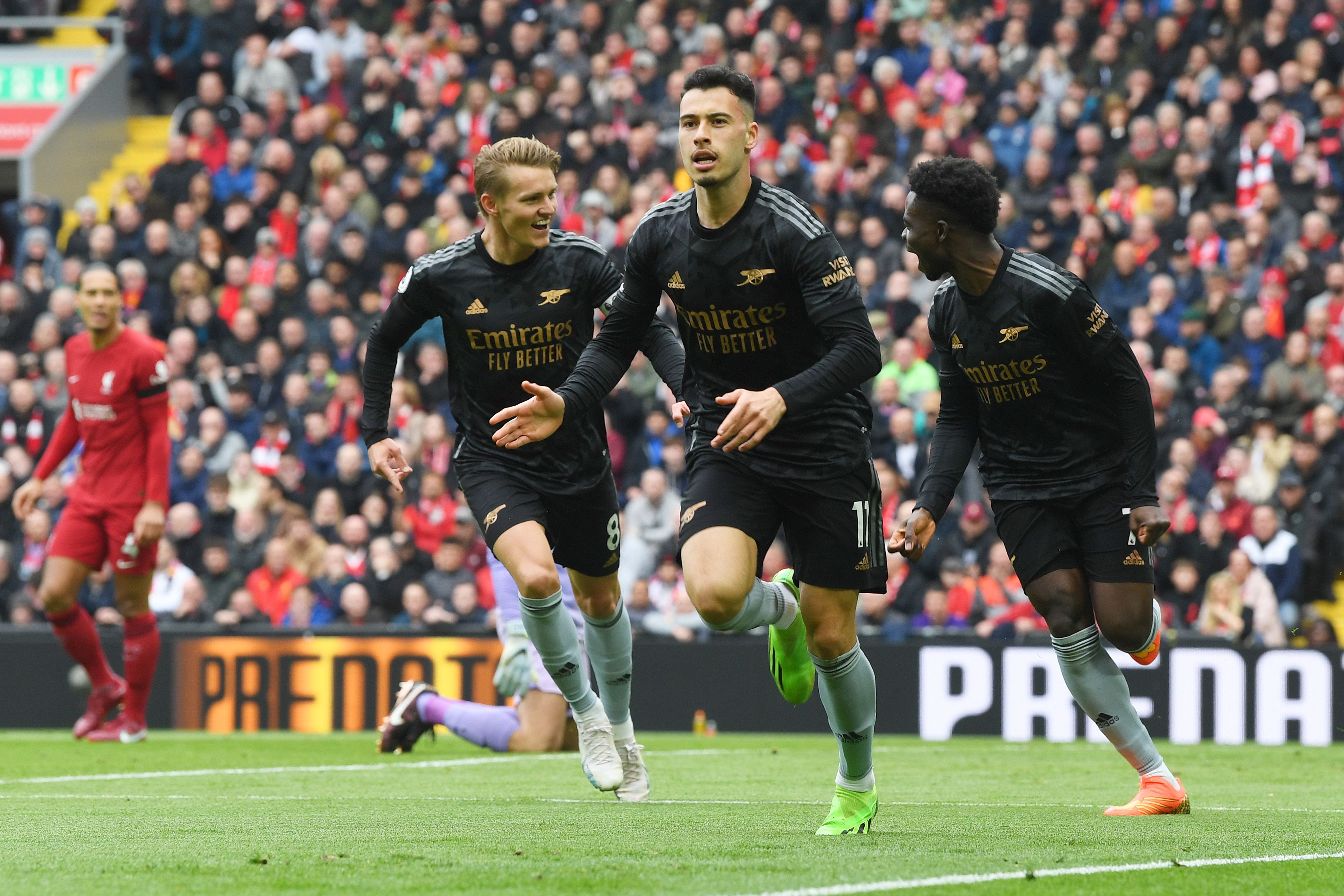 Arsenal celebrate scoring at Liverpool in April 2023
