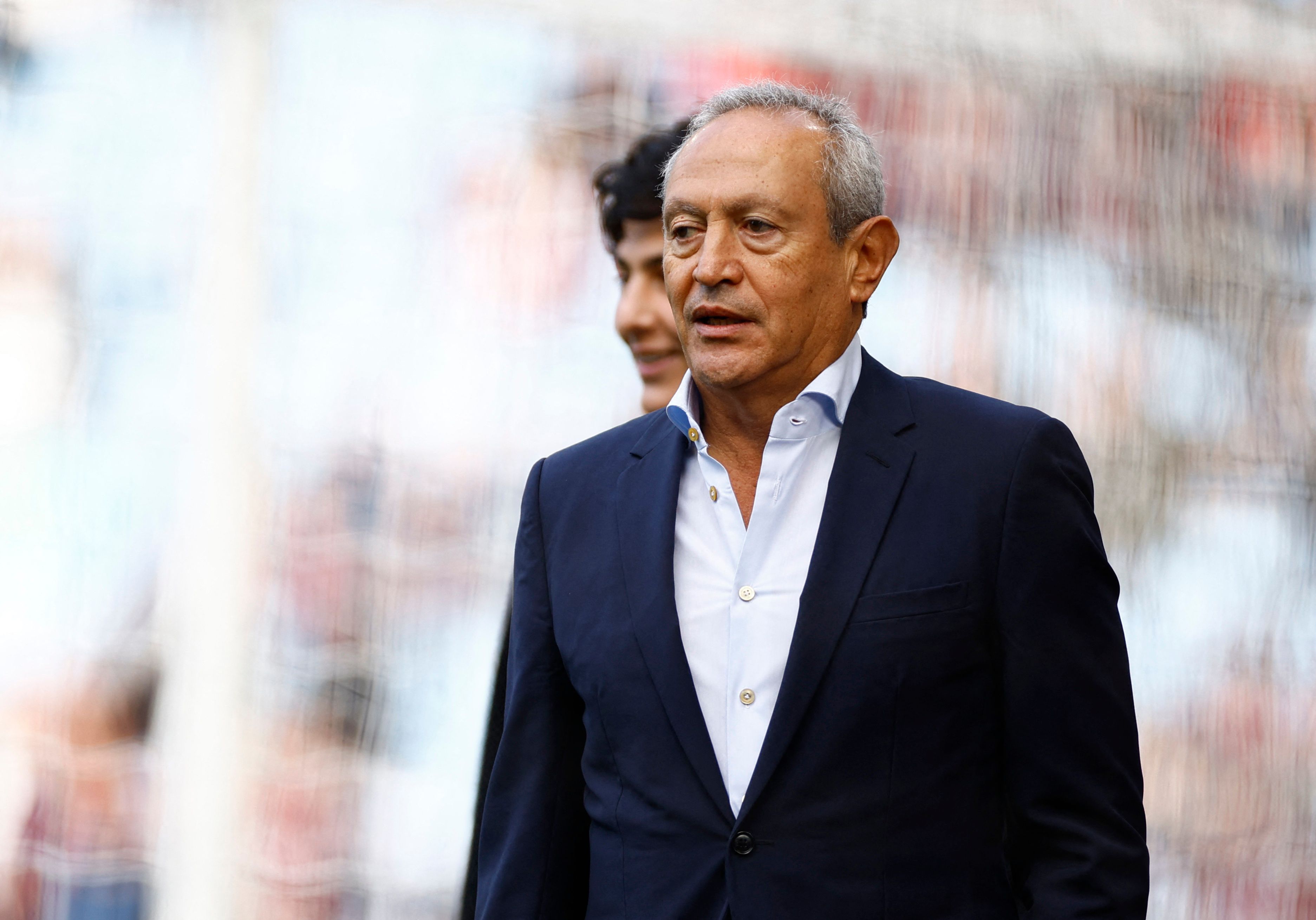 Aston Villa co-owner Nassef Sawiris on the pitch