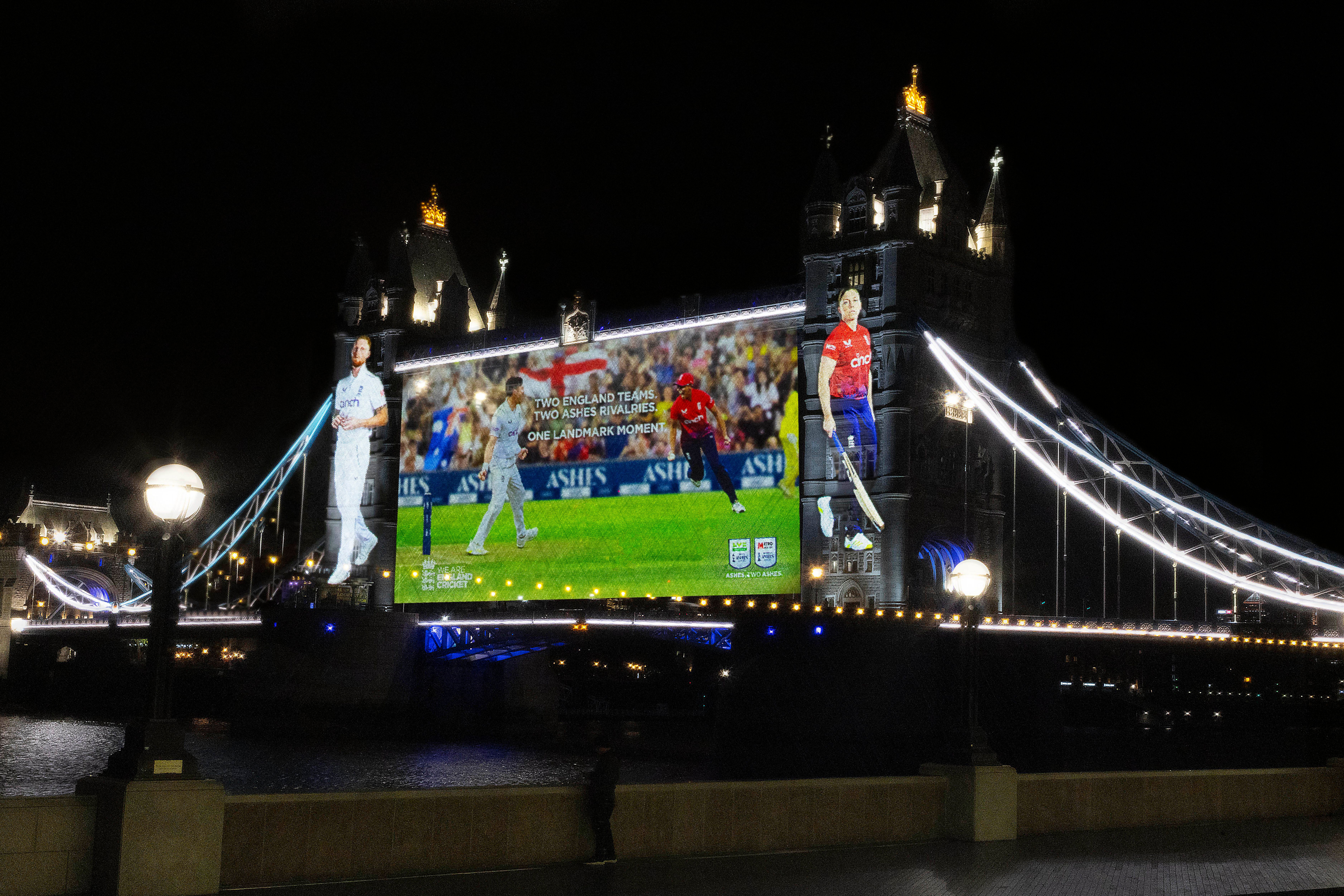 Ben Stokes and Heather Knight projected onto Tower Bridge