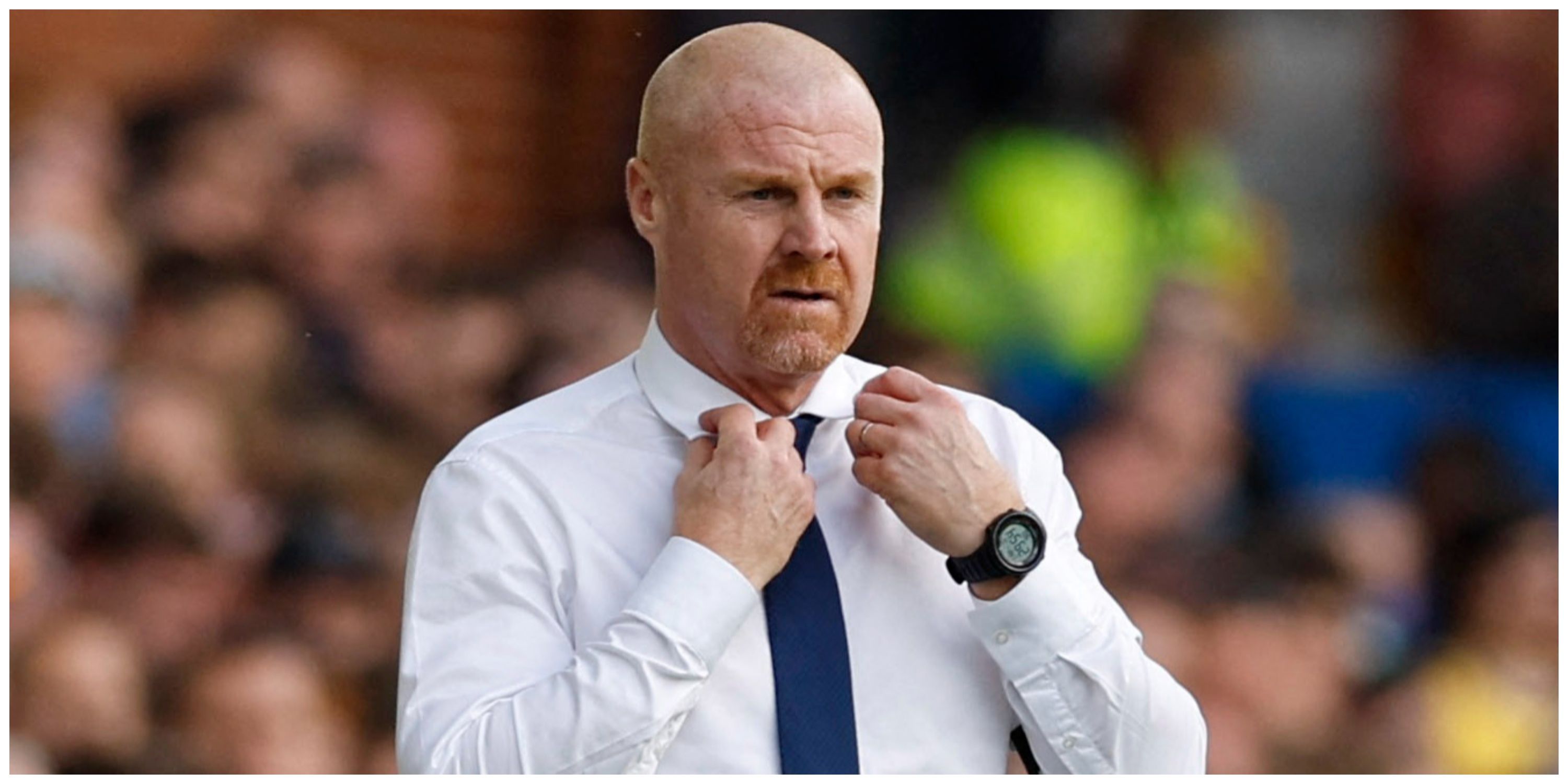 Everton manager Sean Dyche holding collar