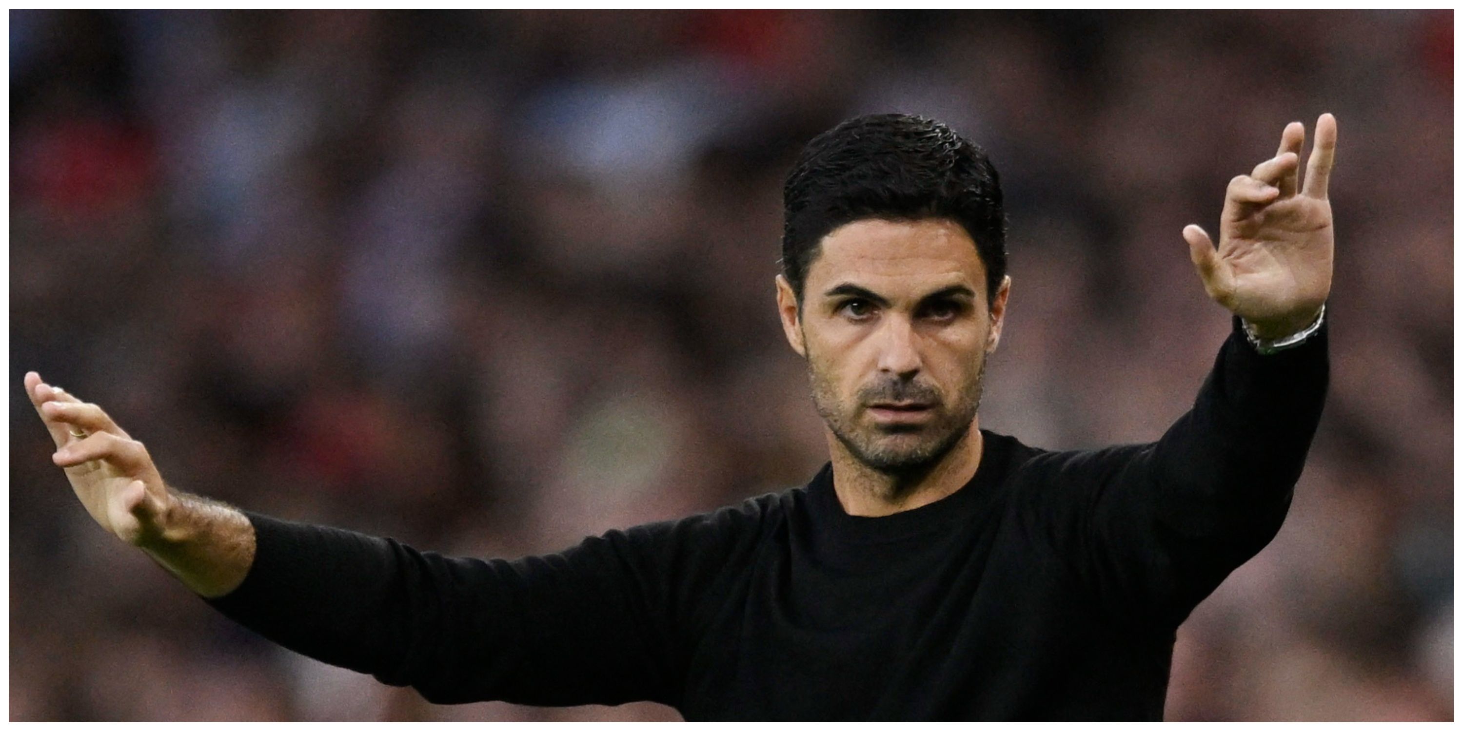 Arsenal manager Mikel Arteta with arms up