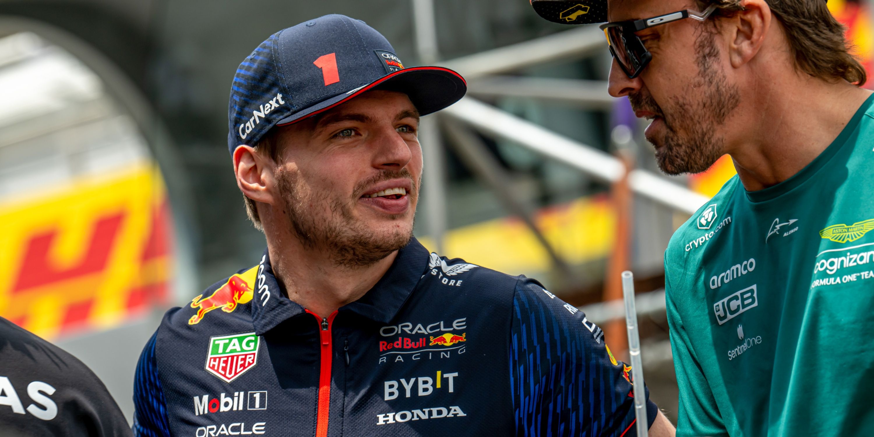 Max Verstappen and Fernando Alonso chat at the Spanish GP