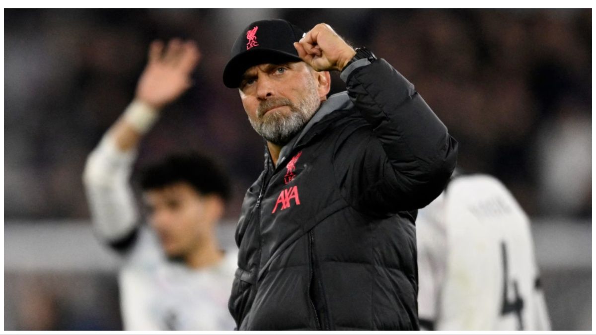 Liverpool manager Jurgen Klopp clenches his fist in celebration to the travelling fans after the Reds clinch three points in a Premier League clash.
