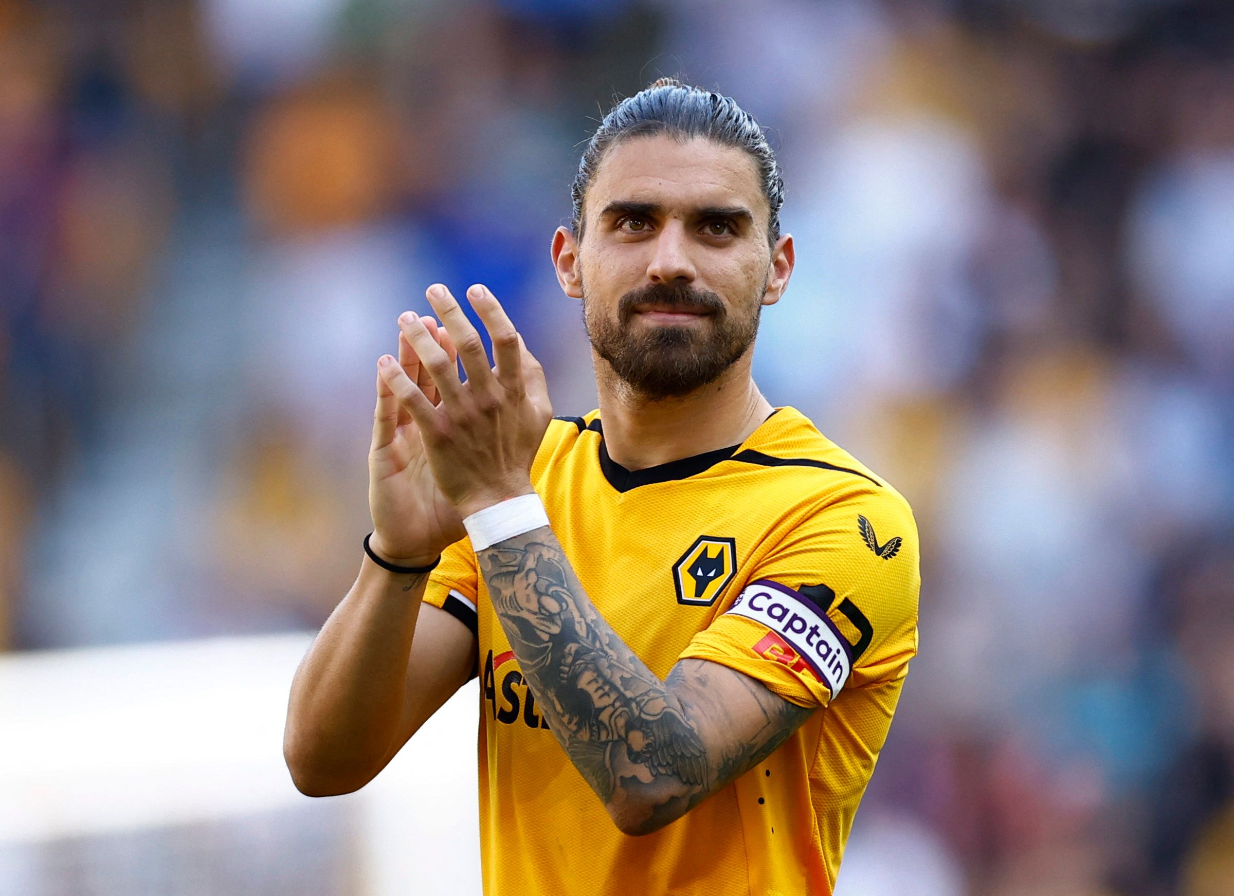 Ruben Neves applauds the Wolves supporters
