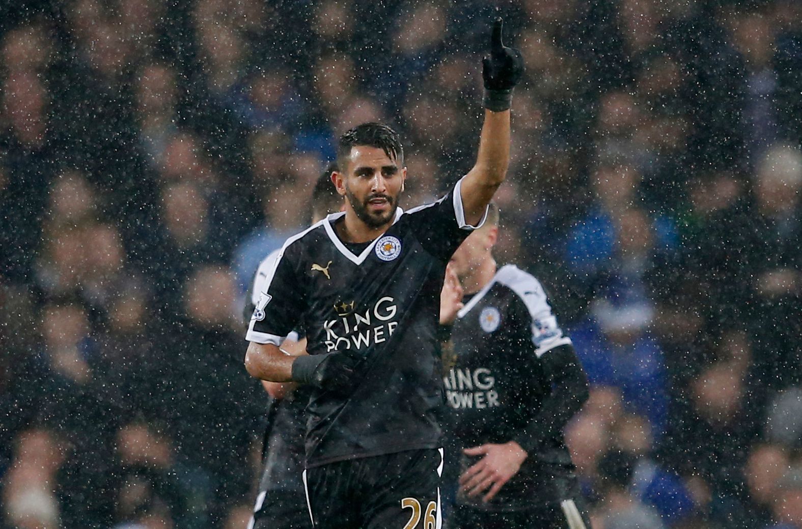 Riyad Mahrez celebrates scoring Leicester's first goal.