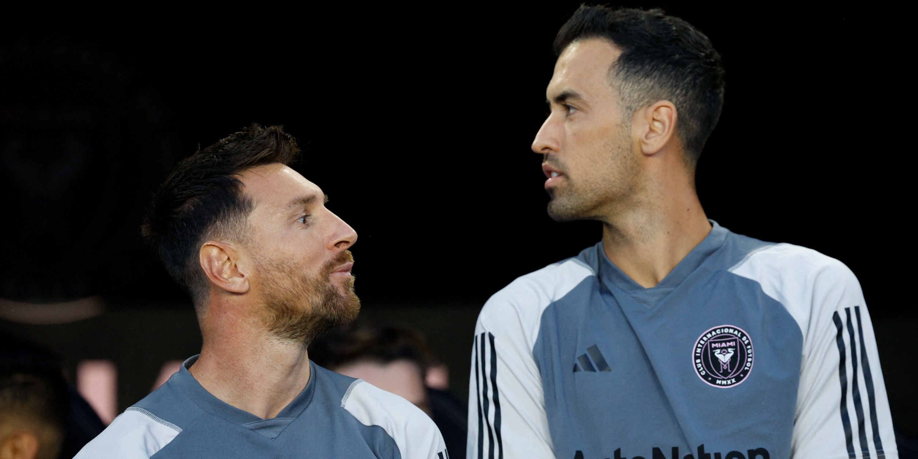 Sergio Busquets and Lionel Messi
