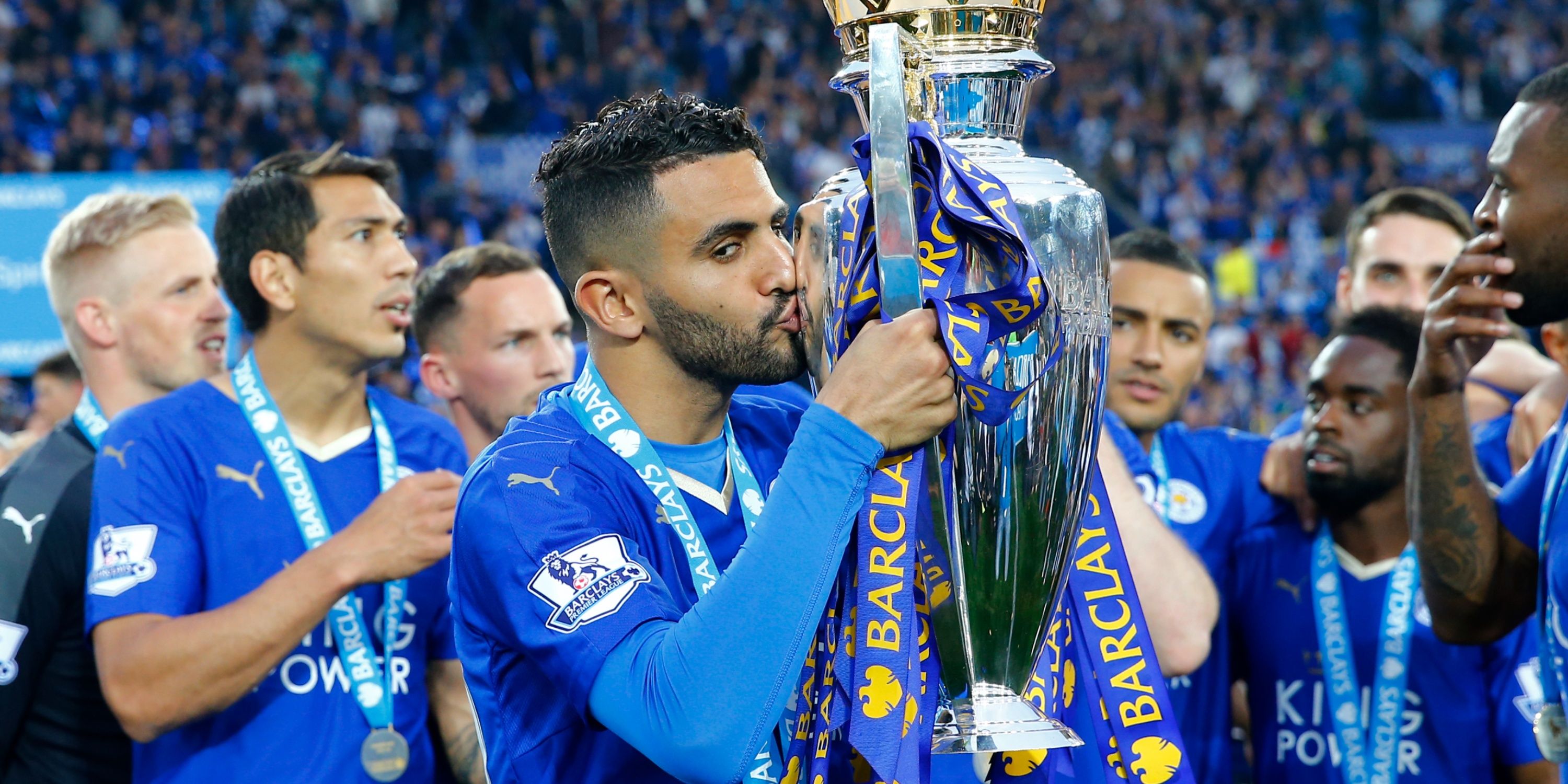 Leicester City's Riyad Mahrez celebrates winning the premier league.