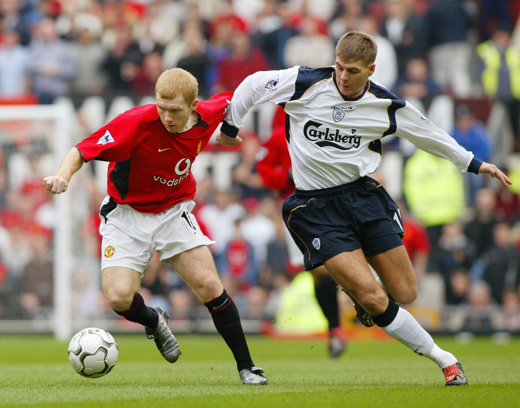 Scholes and Gerrard in action at Old Trafford