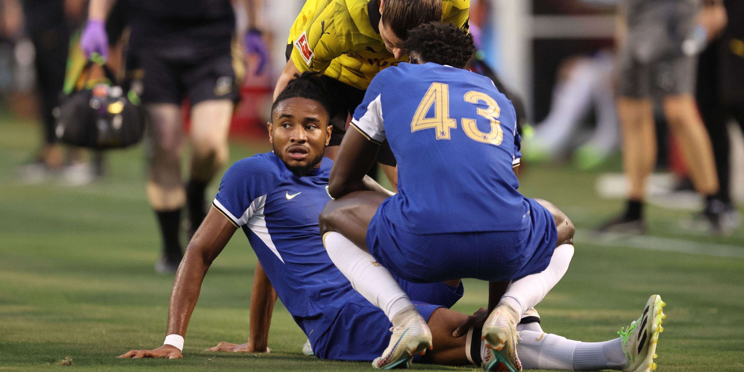 Christopher Nkunku of Chelsea goes down with an injury