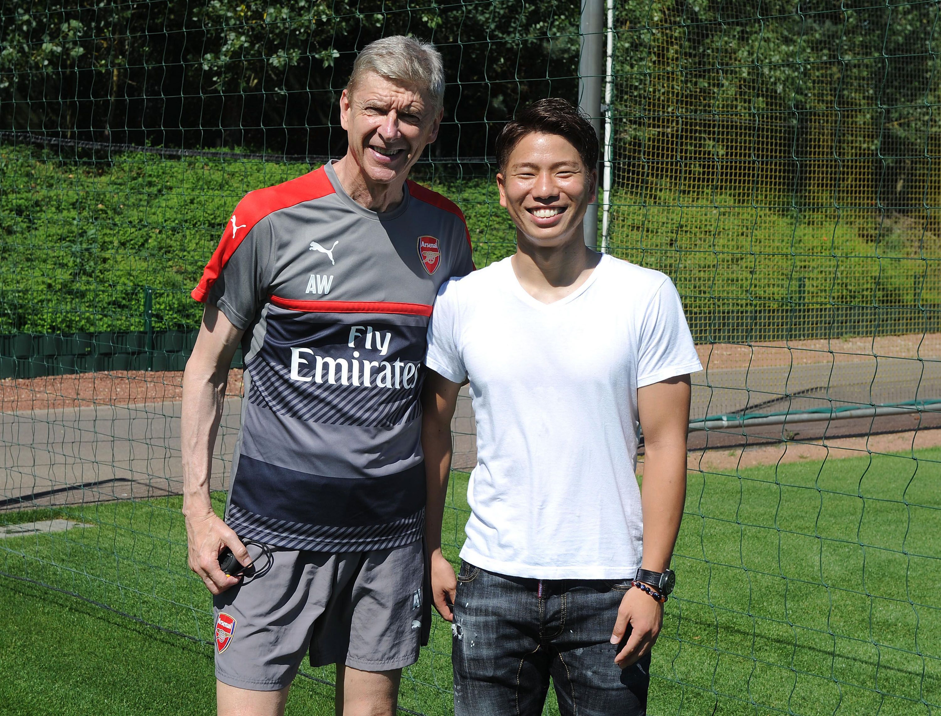 New signing Takuma Asano with Arsenal manager Arsene Wenger