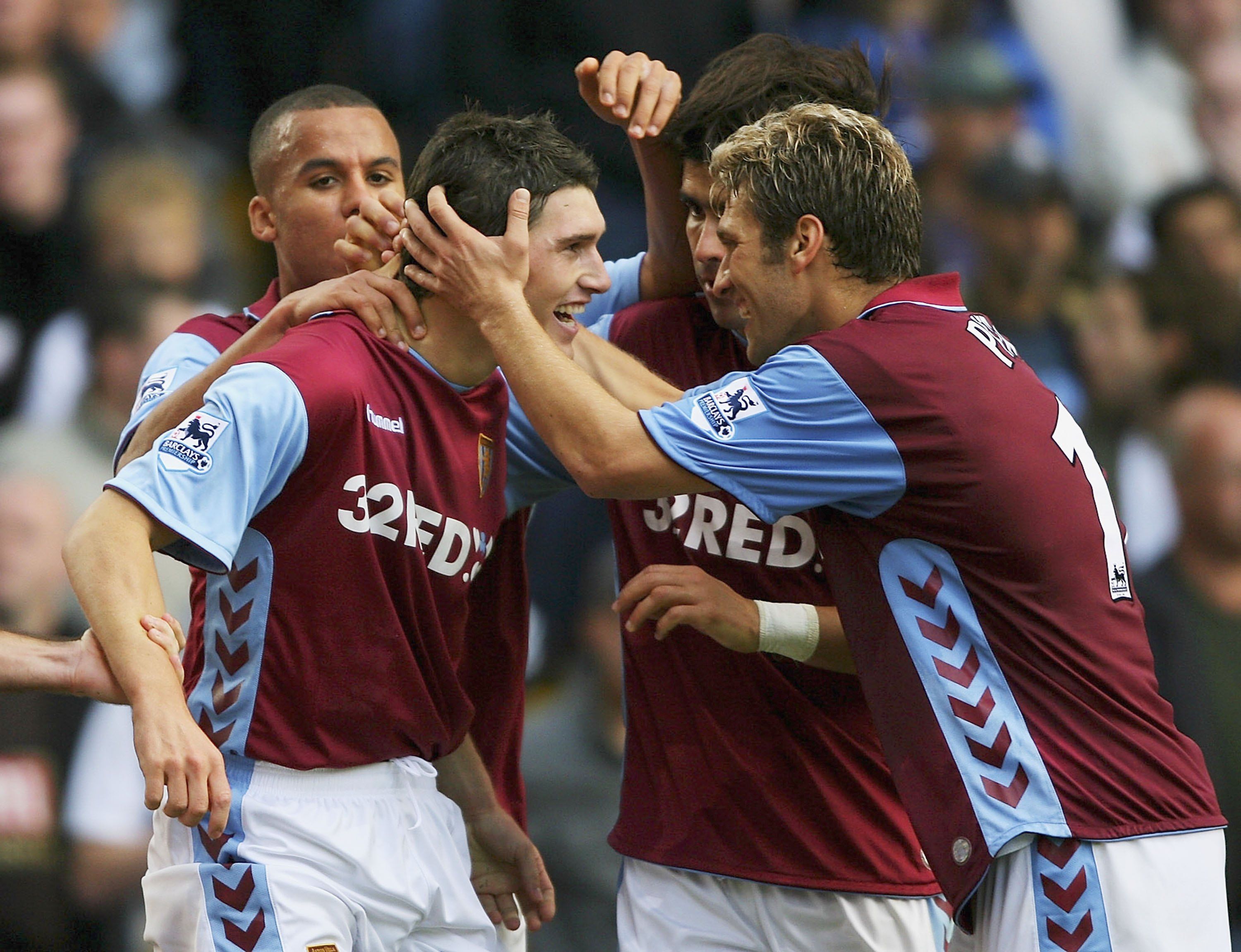 Villa defender Gareth Barry (l) celebrates.
