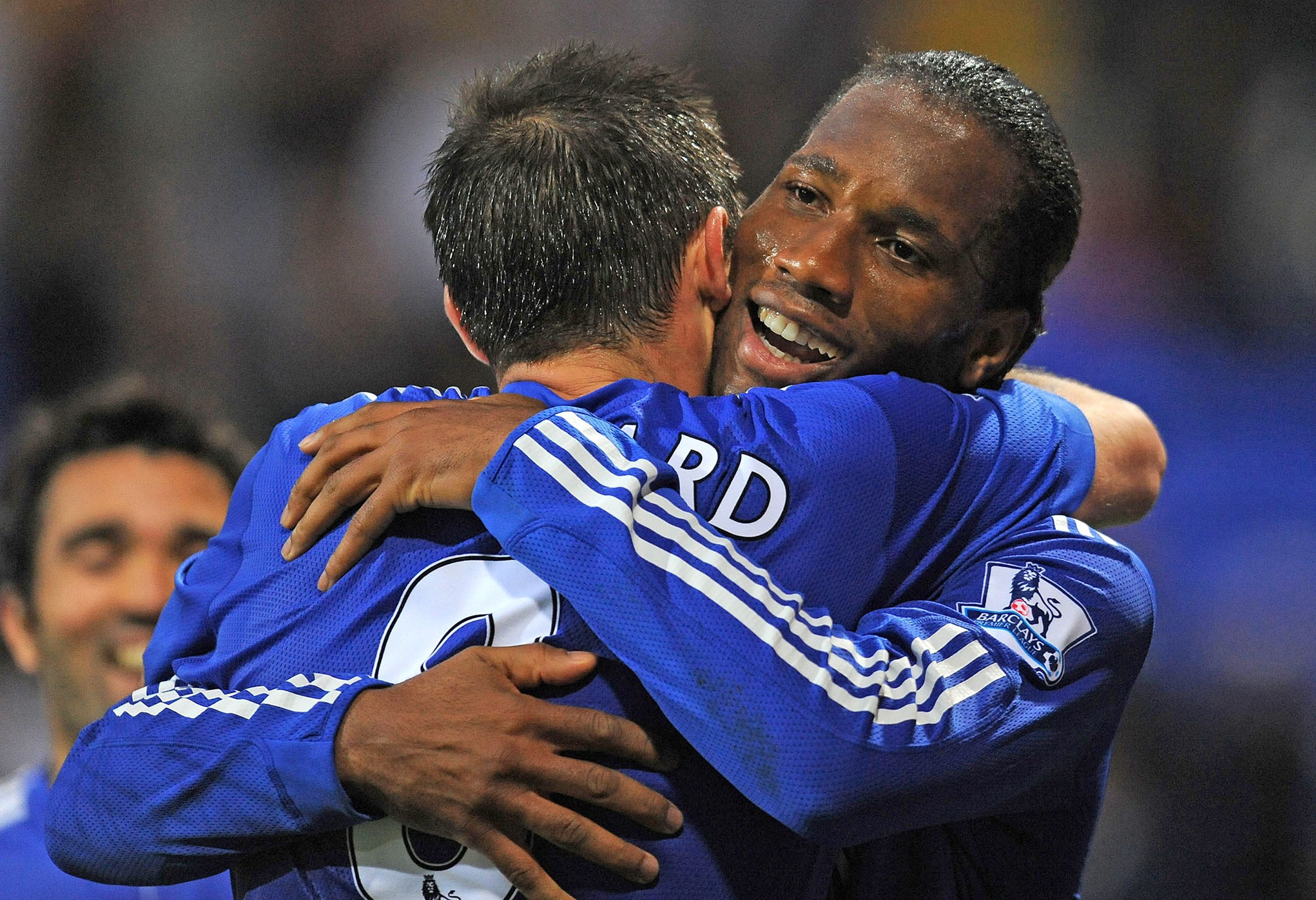 Chelsea's Ivorian forward Didier Drogba (R) celebrates 