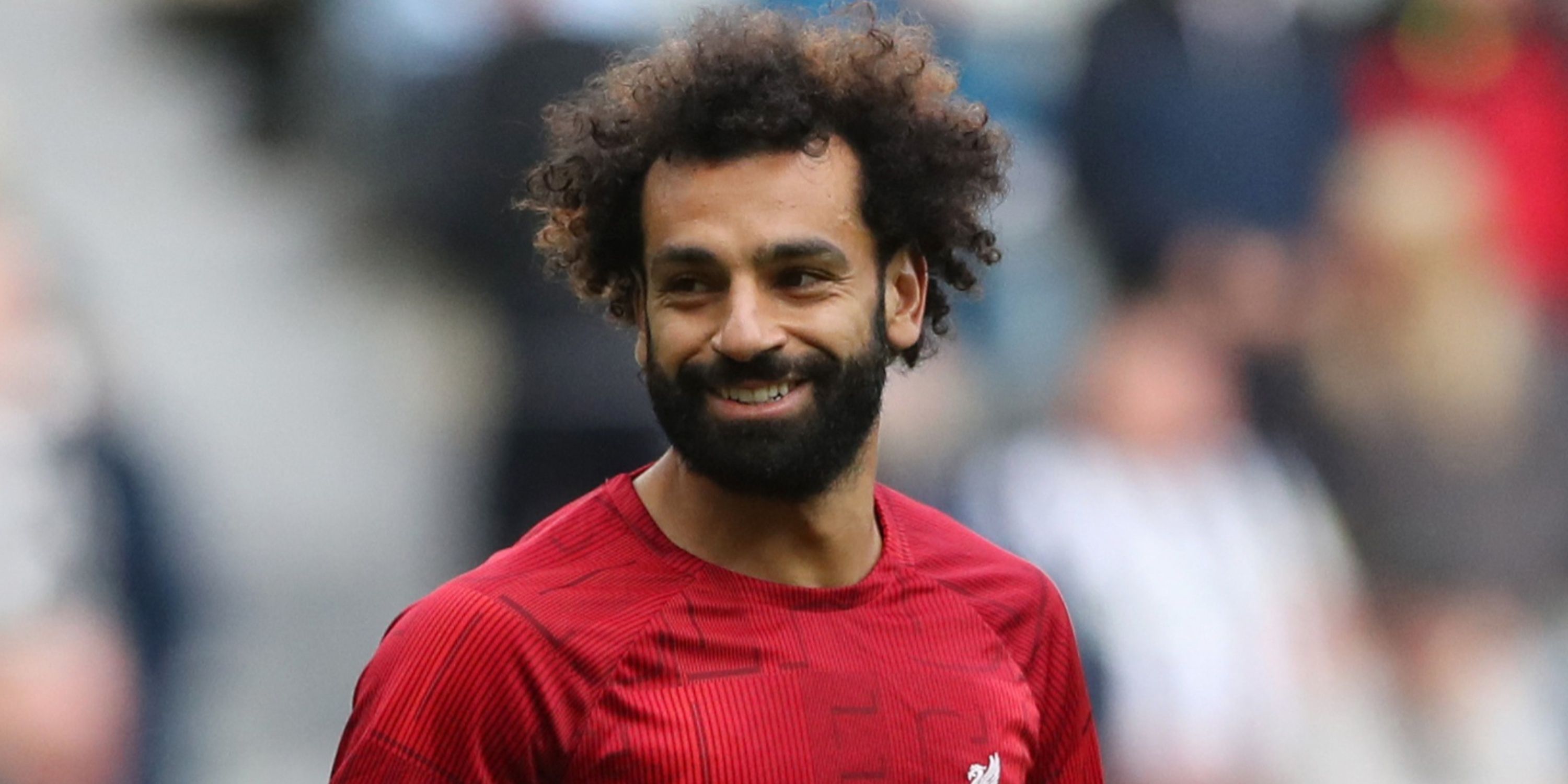 Mohamed Salah warms up for Liverpool