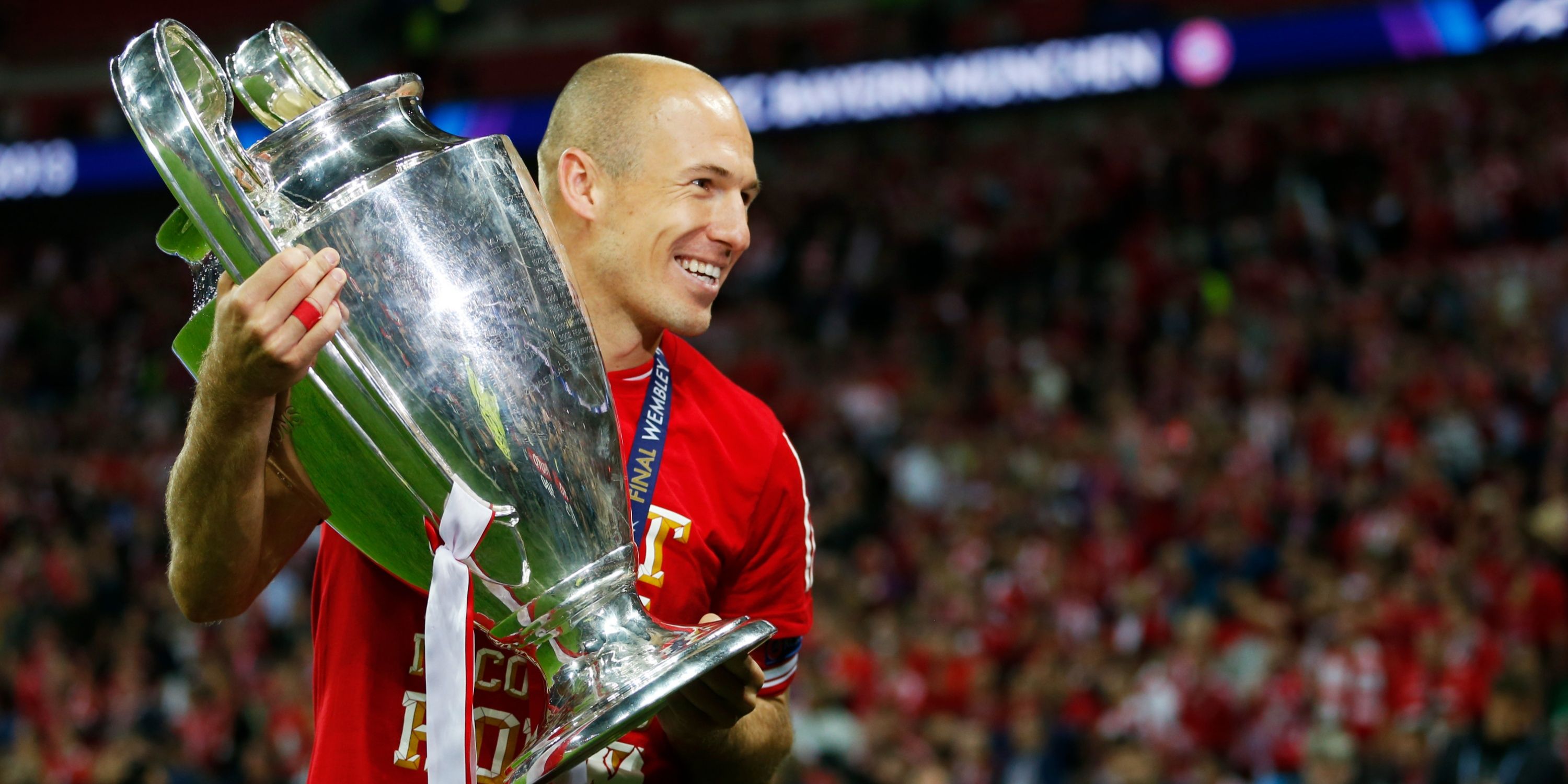 Arjen Robben with the Champions League trophy.