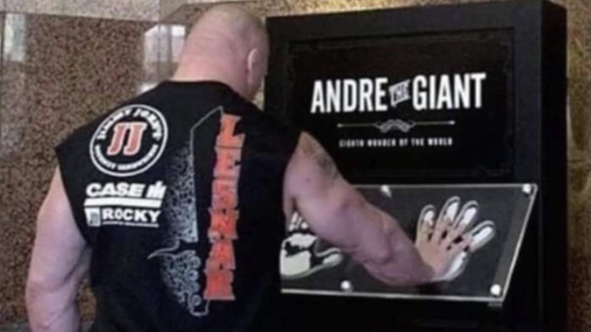 Brock Lesnar comparing his hand size to Andre The Giant