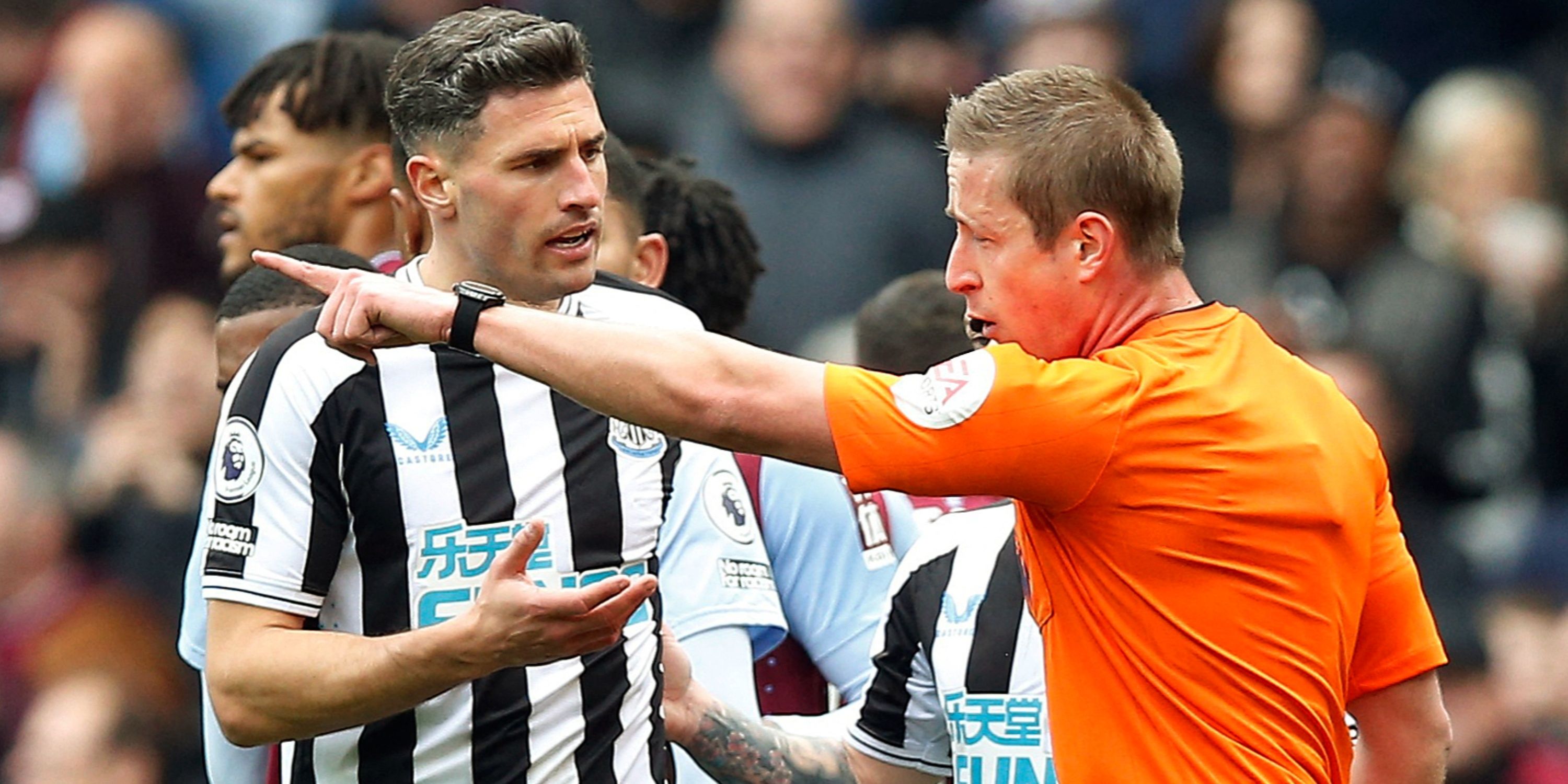 Fabian Schar of Newcastle United talks to the referee