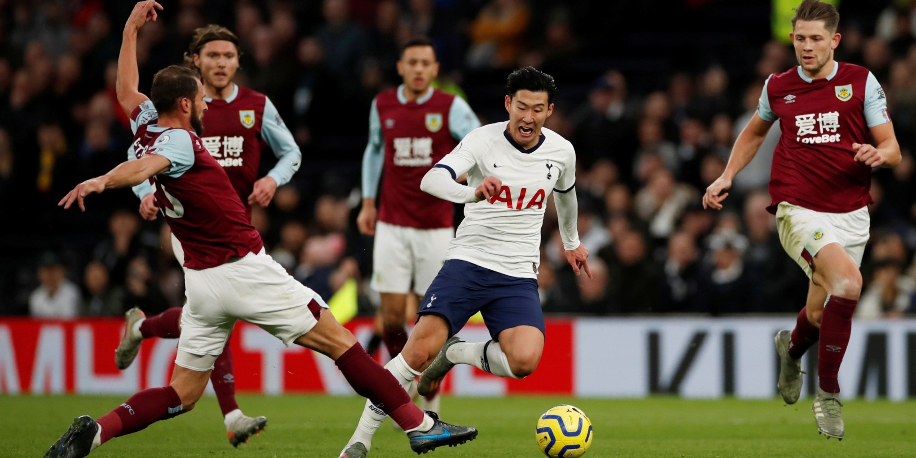 Tottenham's Heung-min Son skips past the challenge of Erik Pieters. 