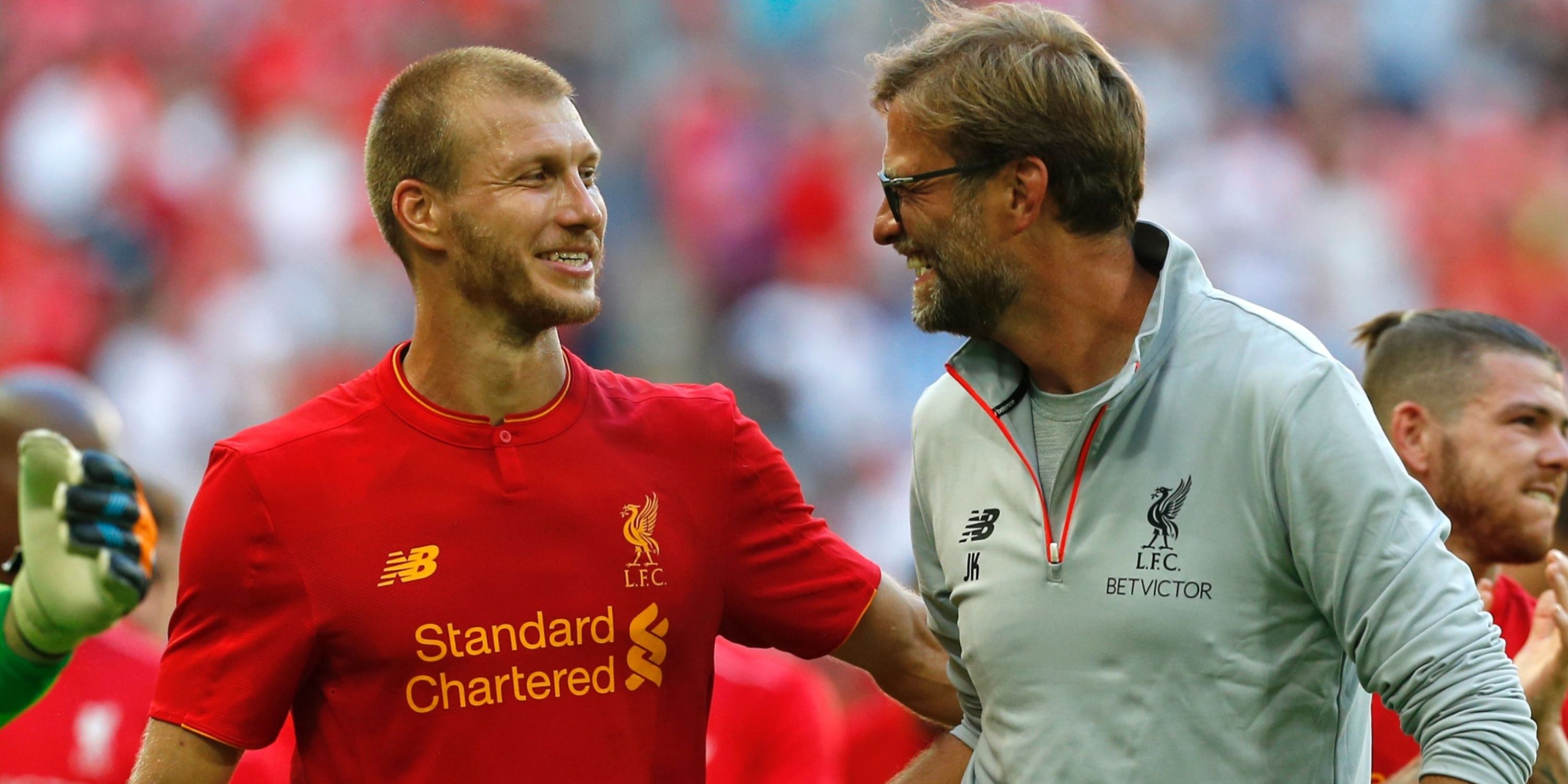 Liverpool boss Jurgen Klopp looks at Ragnar Klavan