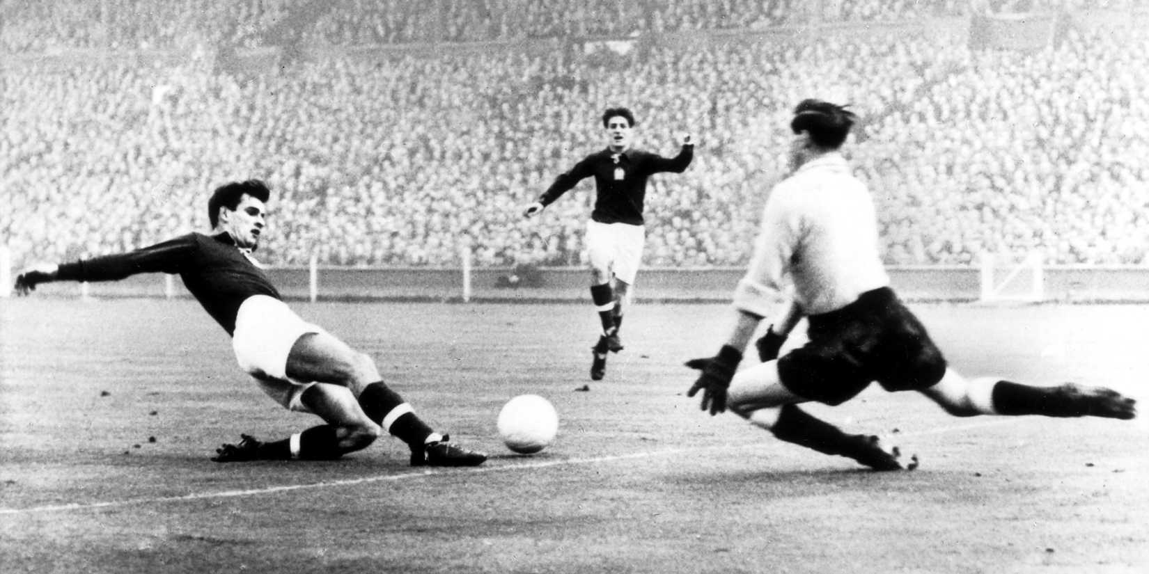 Sándor Kocsis slides in to shoot in 'Match of the Century' against England, 1953.