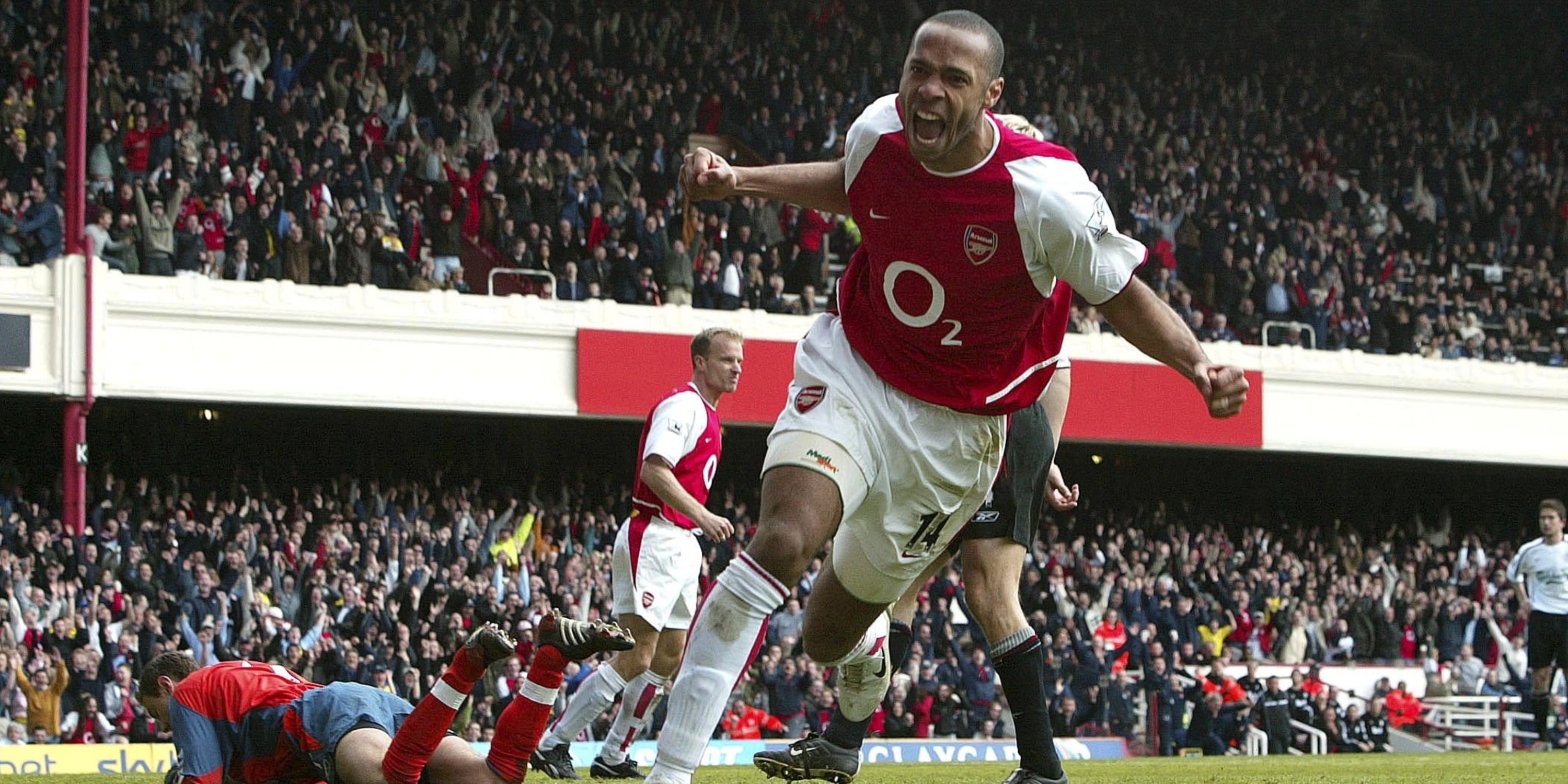 Arsenal's Thierry Henry roars with delight after scoring against Liverpool. 