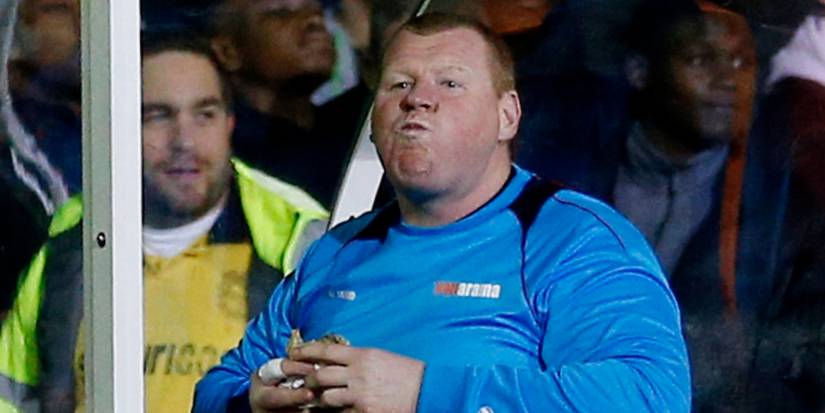 What happened to Sutton's Wayne Shaw after he ate a pie in FA Cup game