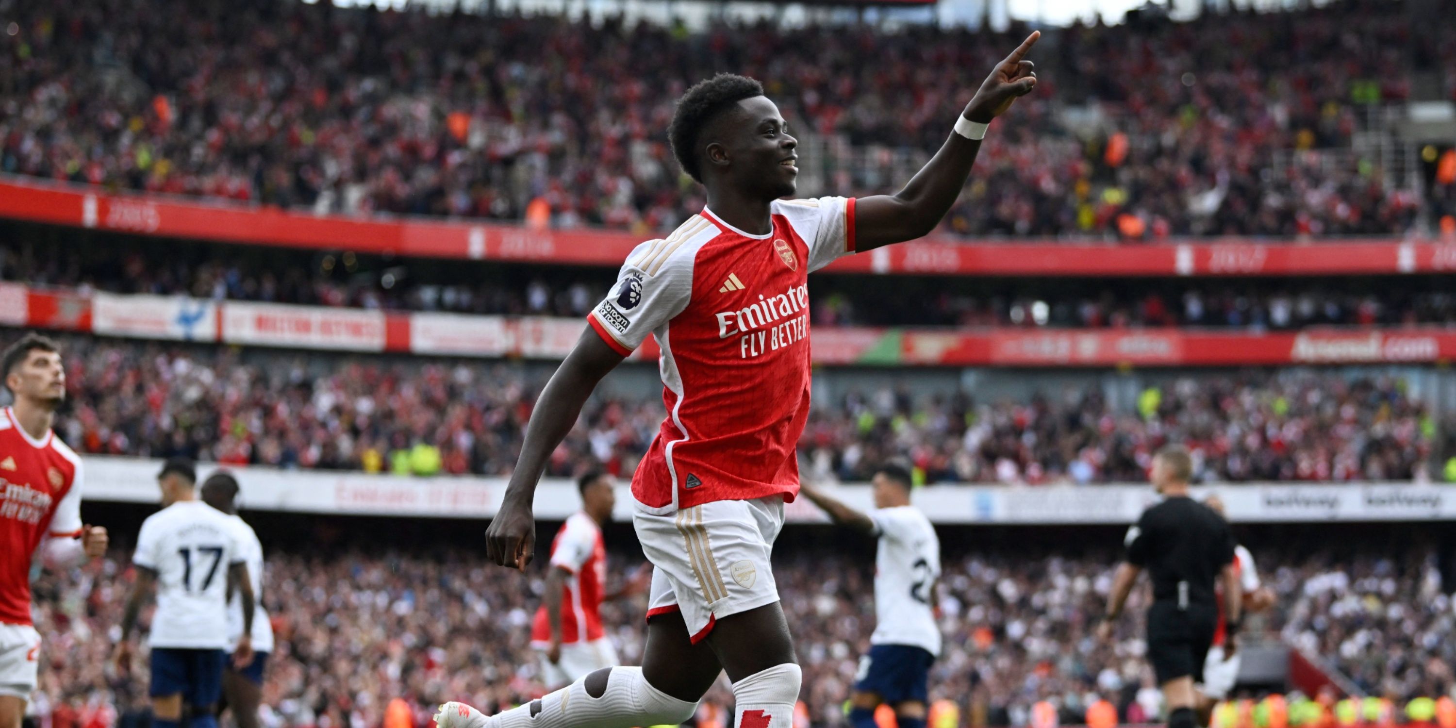 Arsenal's Bukayo Saka celebrates scoring vs Tottenham