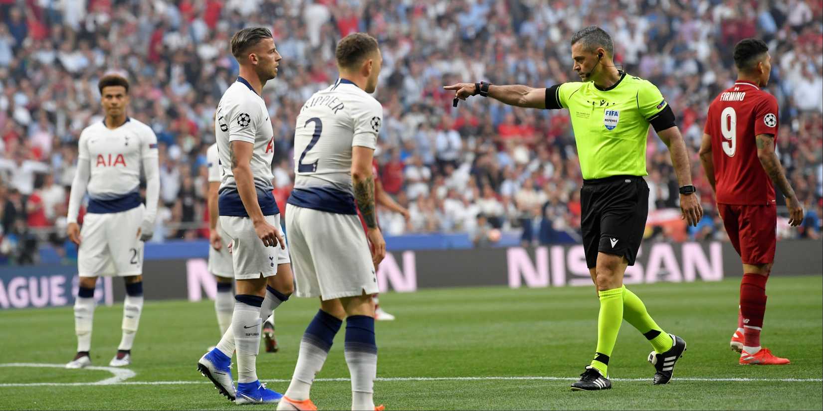 Referee Damir Skomina awards Liverpool a penalty 