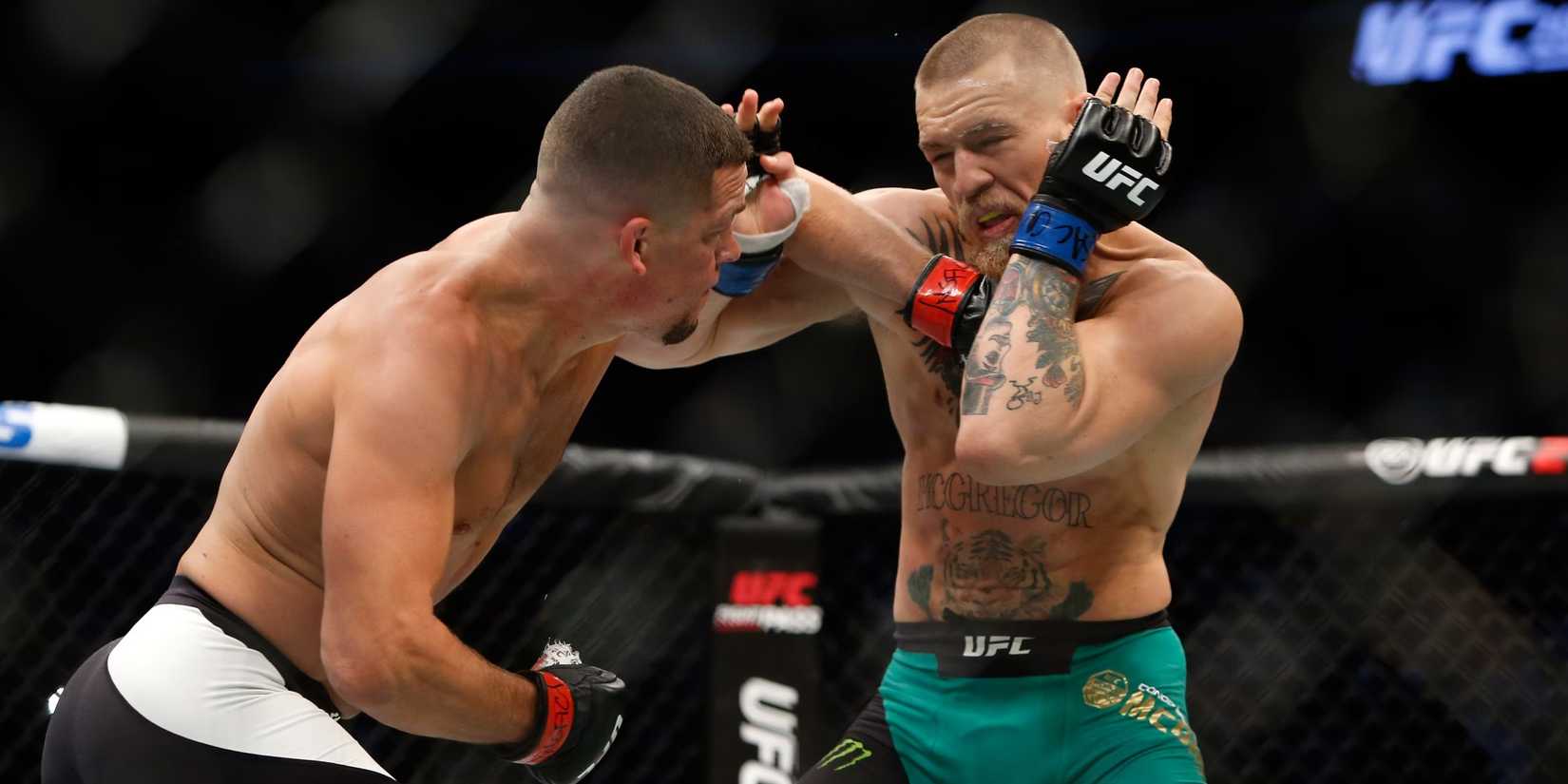Nate Diaz punches Conor McGregor