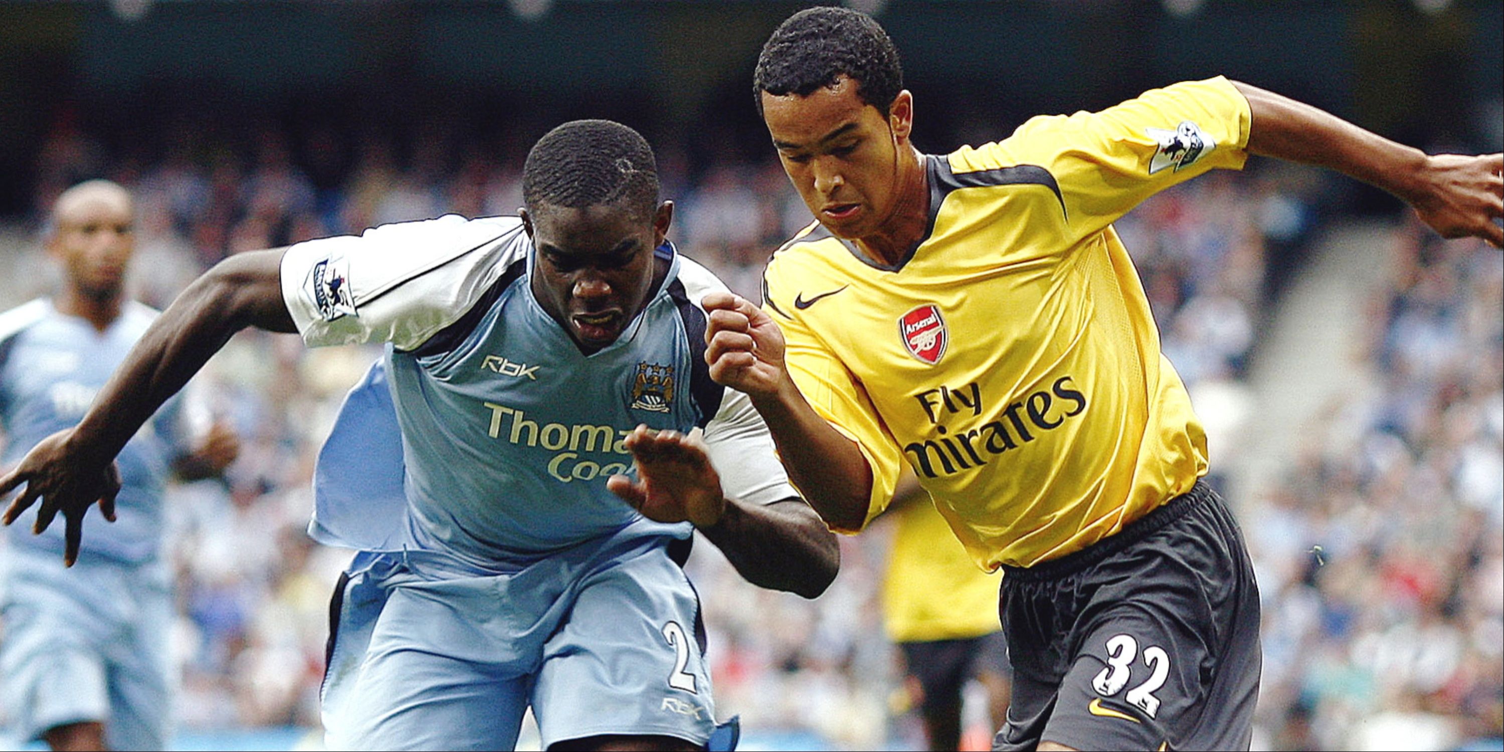 Manchester City's Micah Richards and Arsenal's Theo Walcott