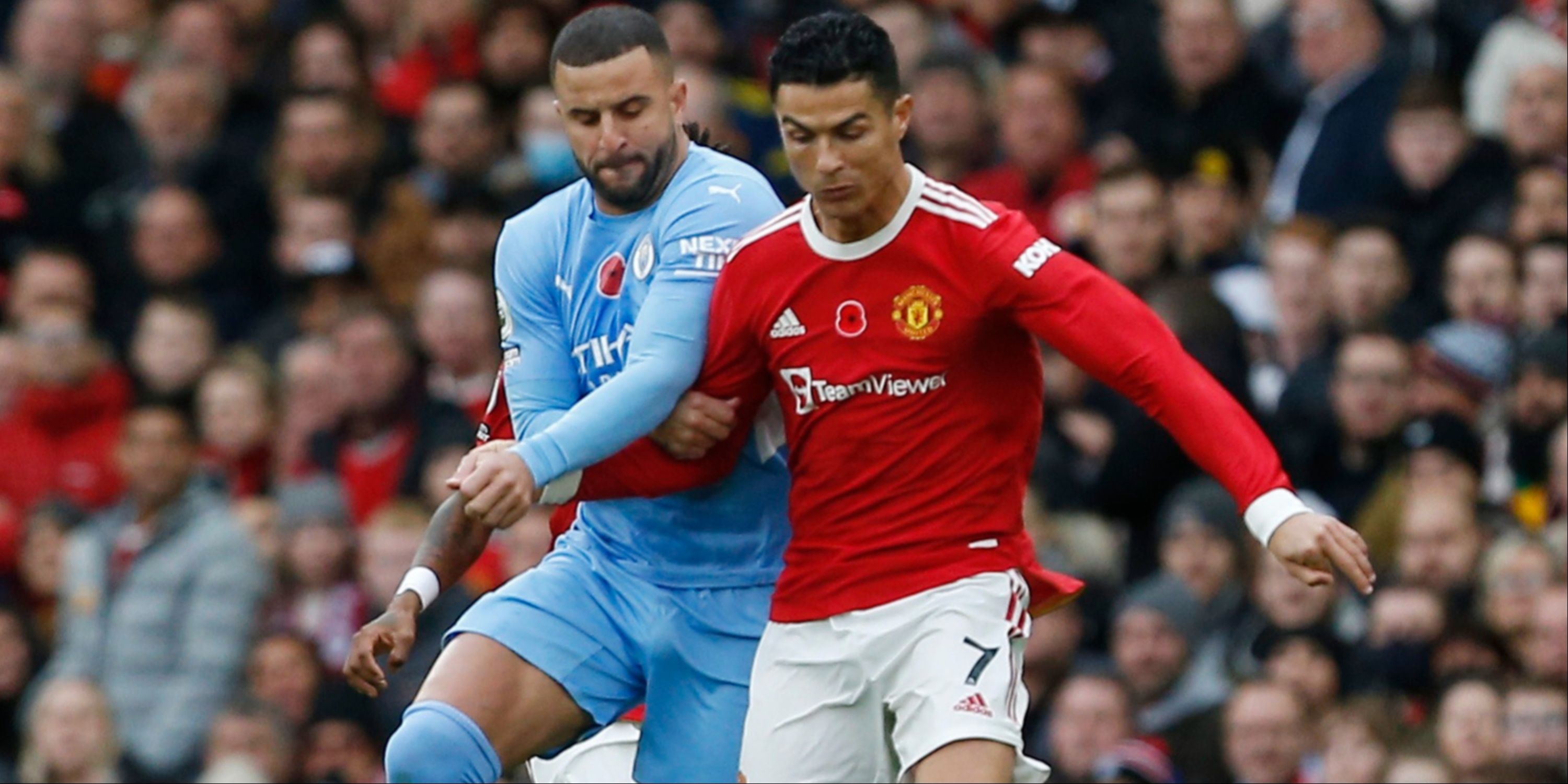 Manchester City's Kyle Walker in action with Manchester United's Cristiano Ronaldo
