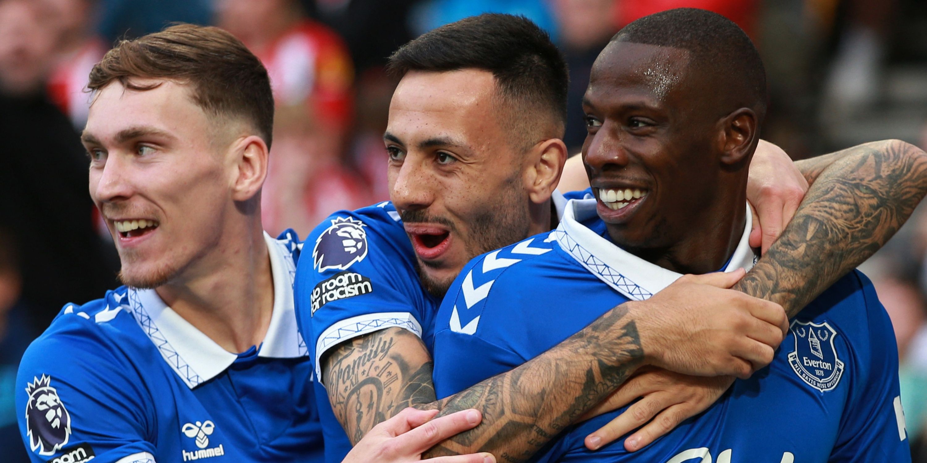 Everton players celebrate a goal