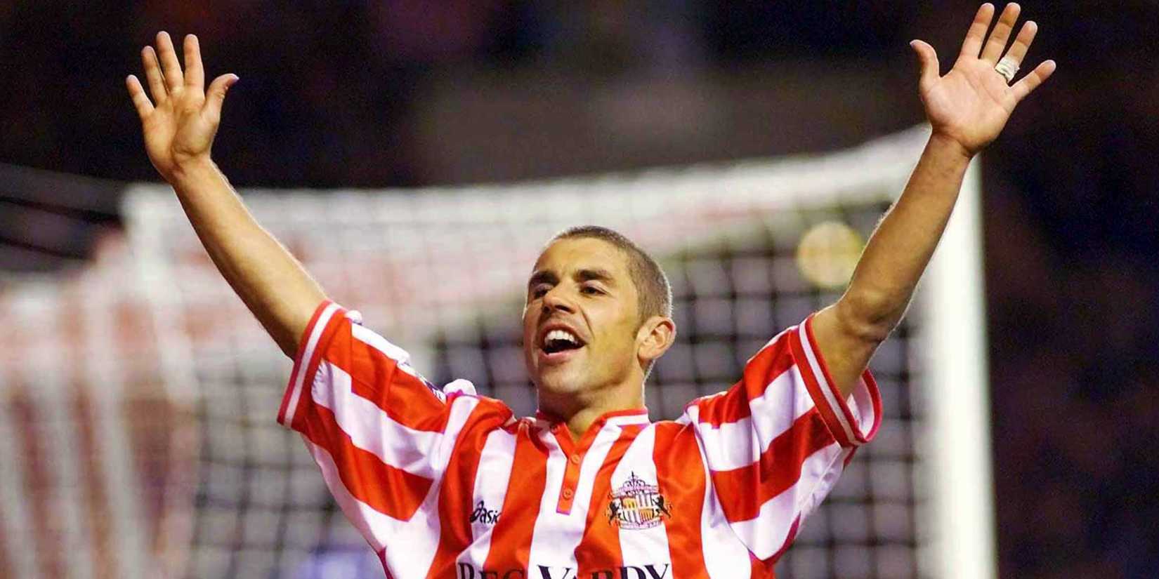 Kevin Phillips hoists his arms in celebration after scoring for Sunderland. 