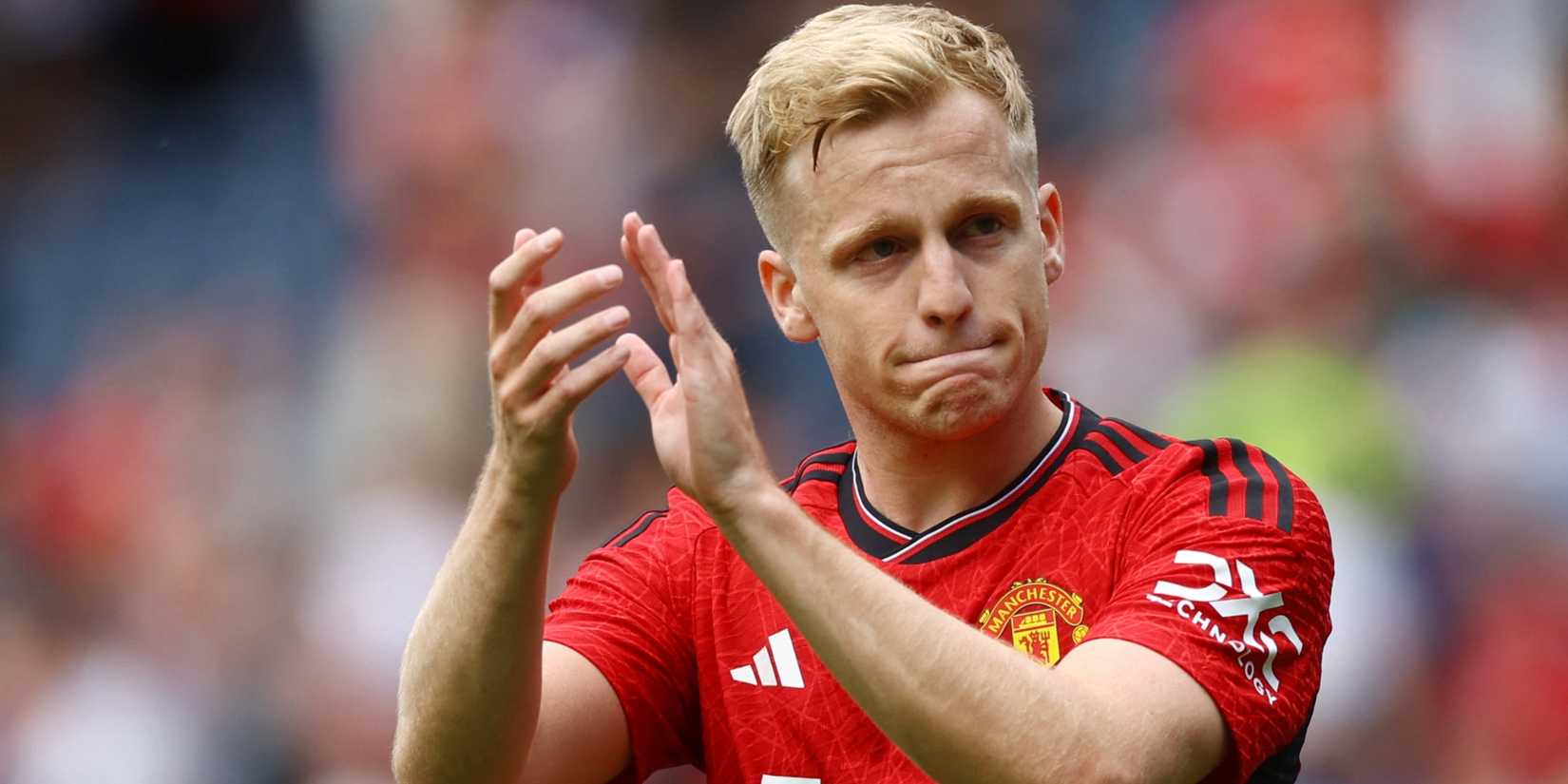 Manchester United midfielder Donny van de Beek clapping