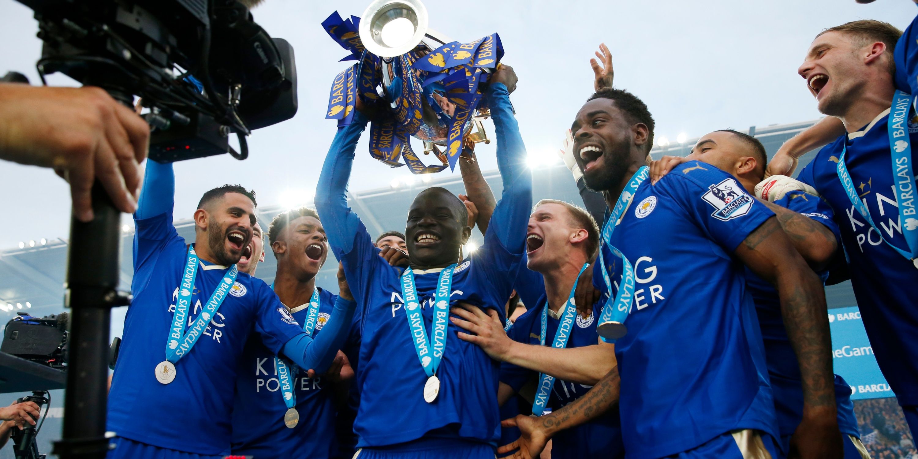 Leicester City's N'Golo Kante lifts the Premier League trophy. 