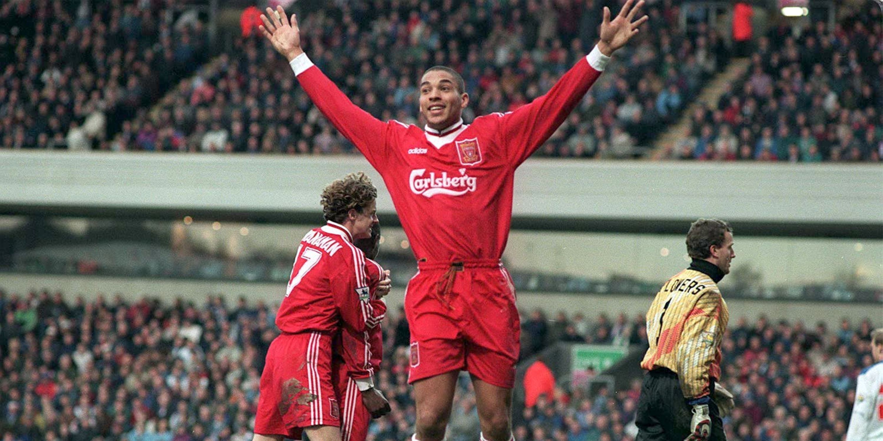 Stan Collymore celebrates