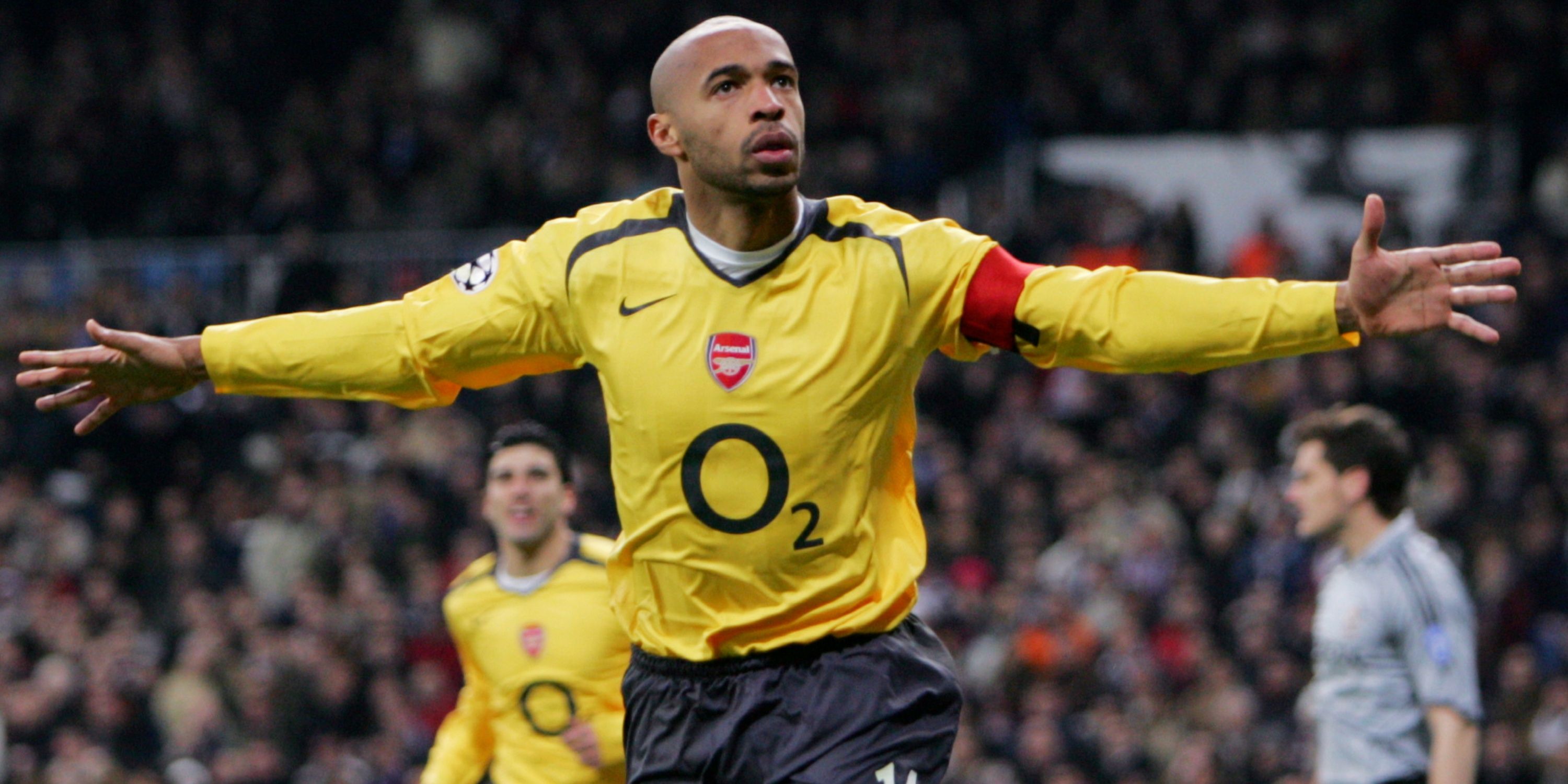 Thierry Henry celebrates scoring against Real Madrid for Arsenal