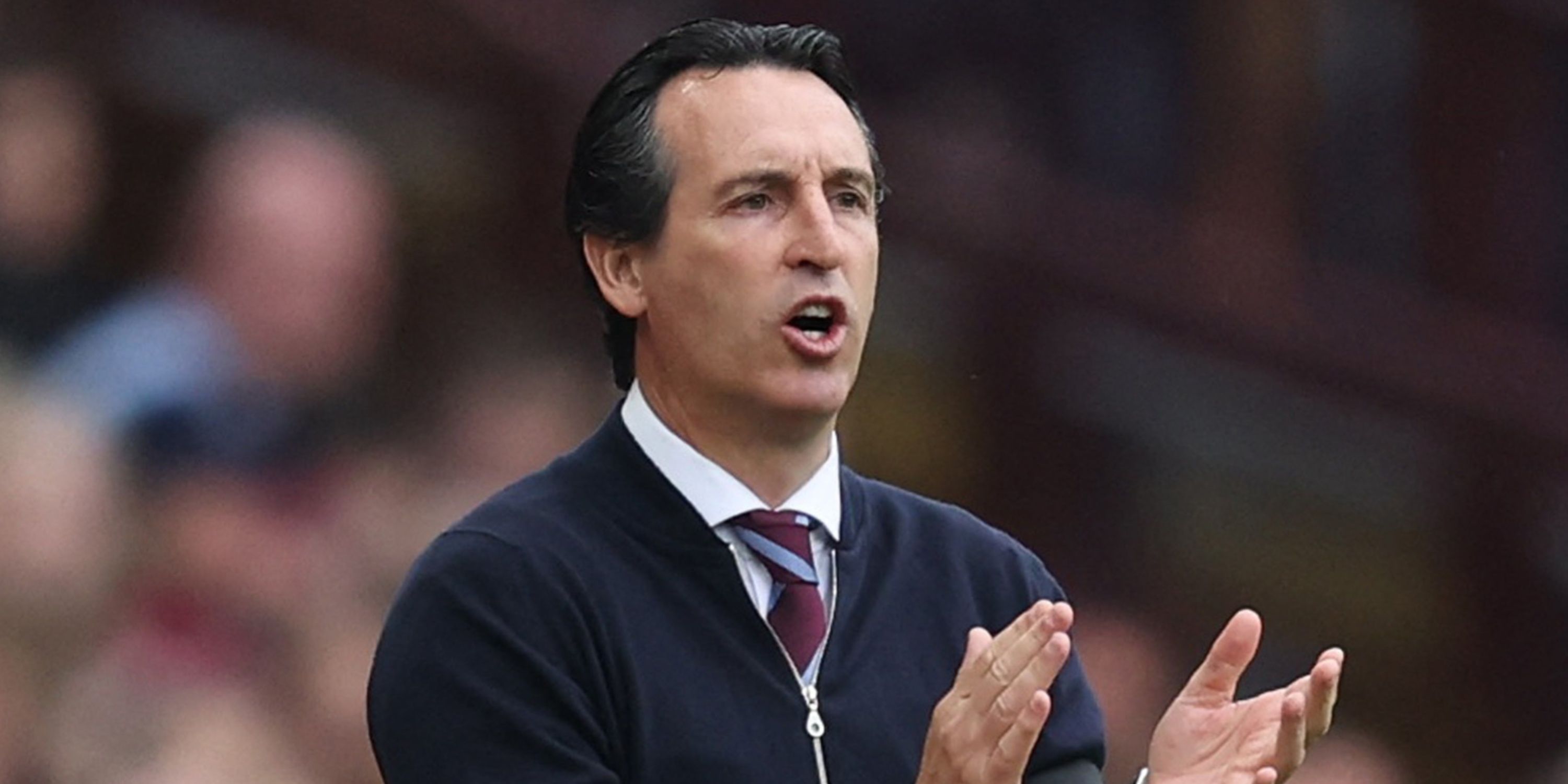 Aston Villa boss Unai Emery applauding his players from the touchline
