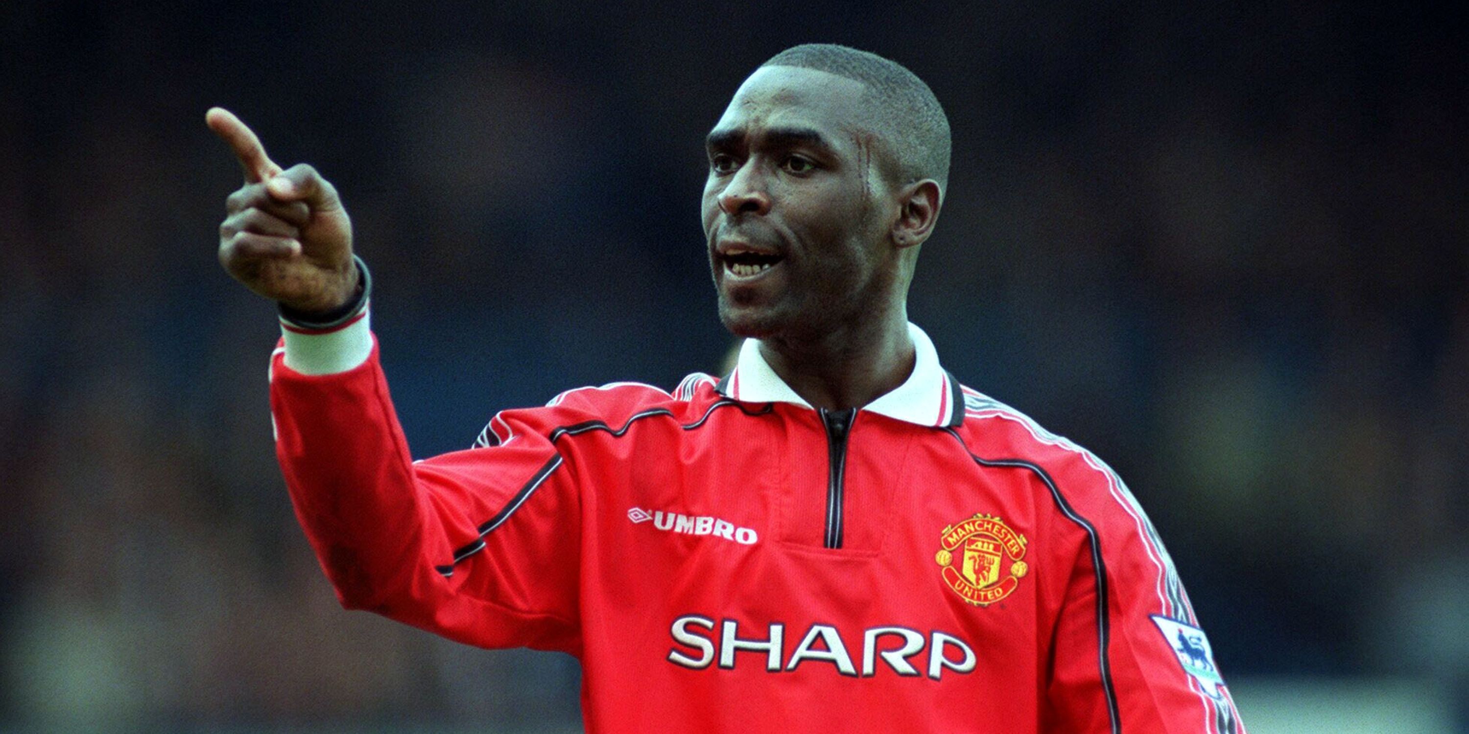 Manchester United's Andrew Cole celebrates scoring a goal.