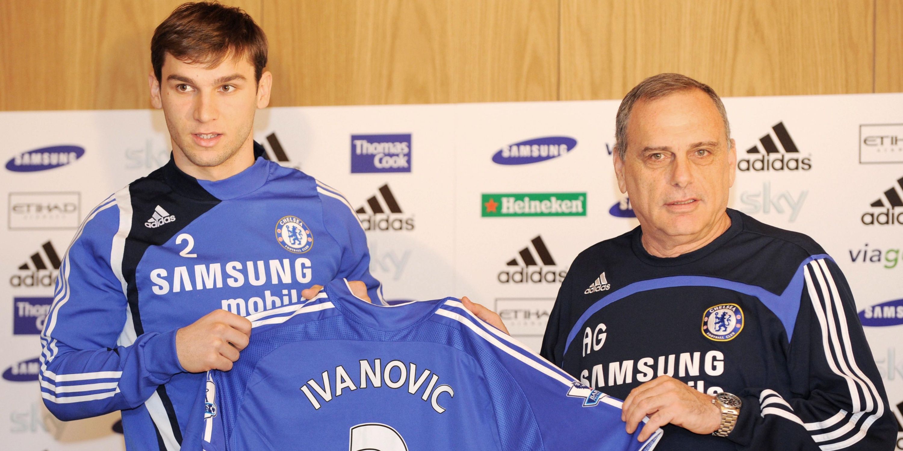 New signing Branislav Ivanovic poses with a Chelsea shirt with manager Avram Grant. 