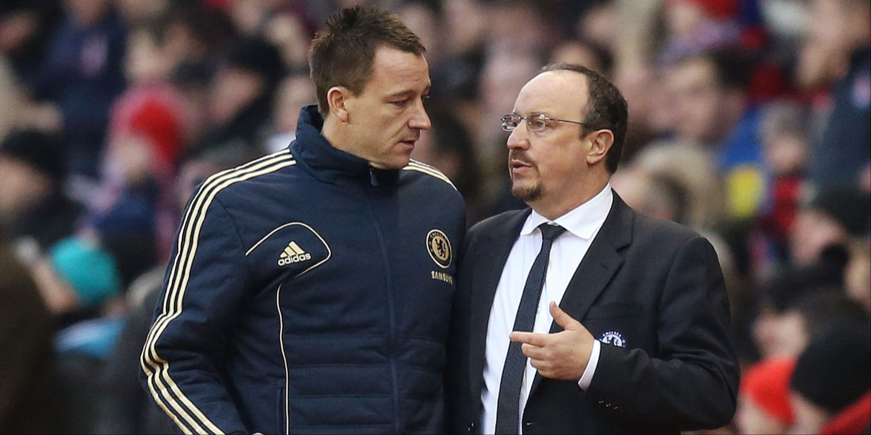 Chelsea's interim manager Rafael Benitez (R) and John Terry