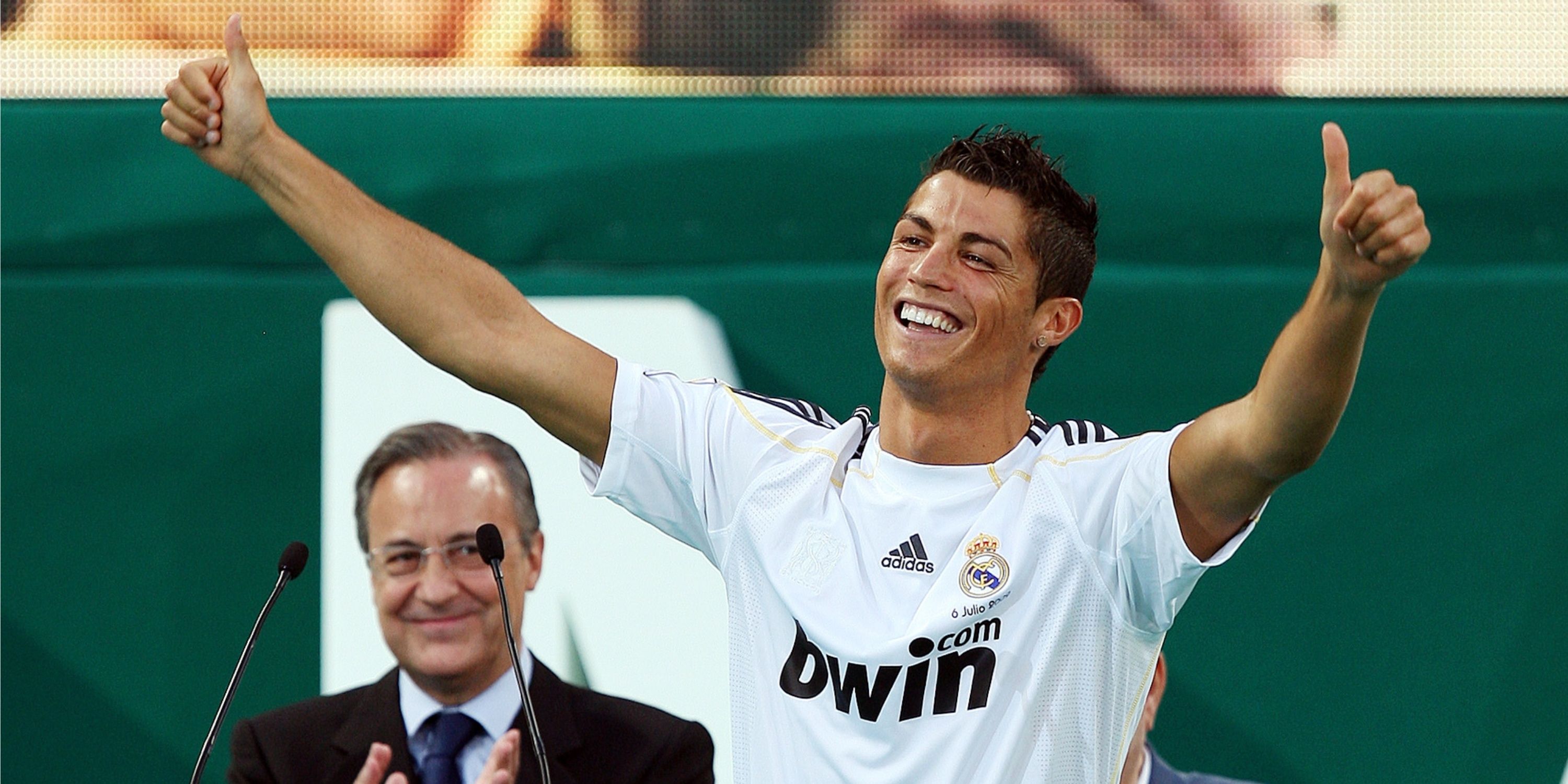 Cristiano Ronaldo gives a thumbs up to his new supporters after being unveilled as a Real Madrid player.