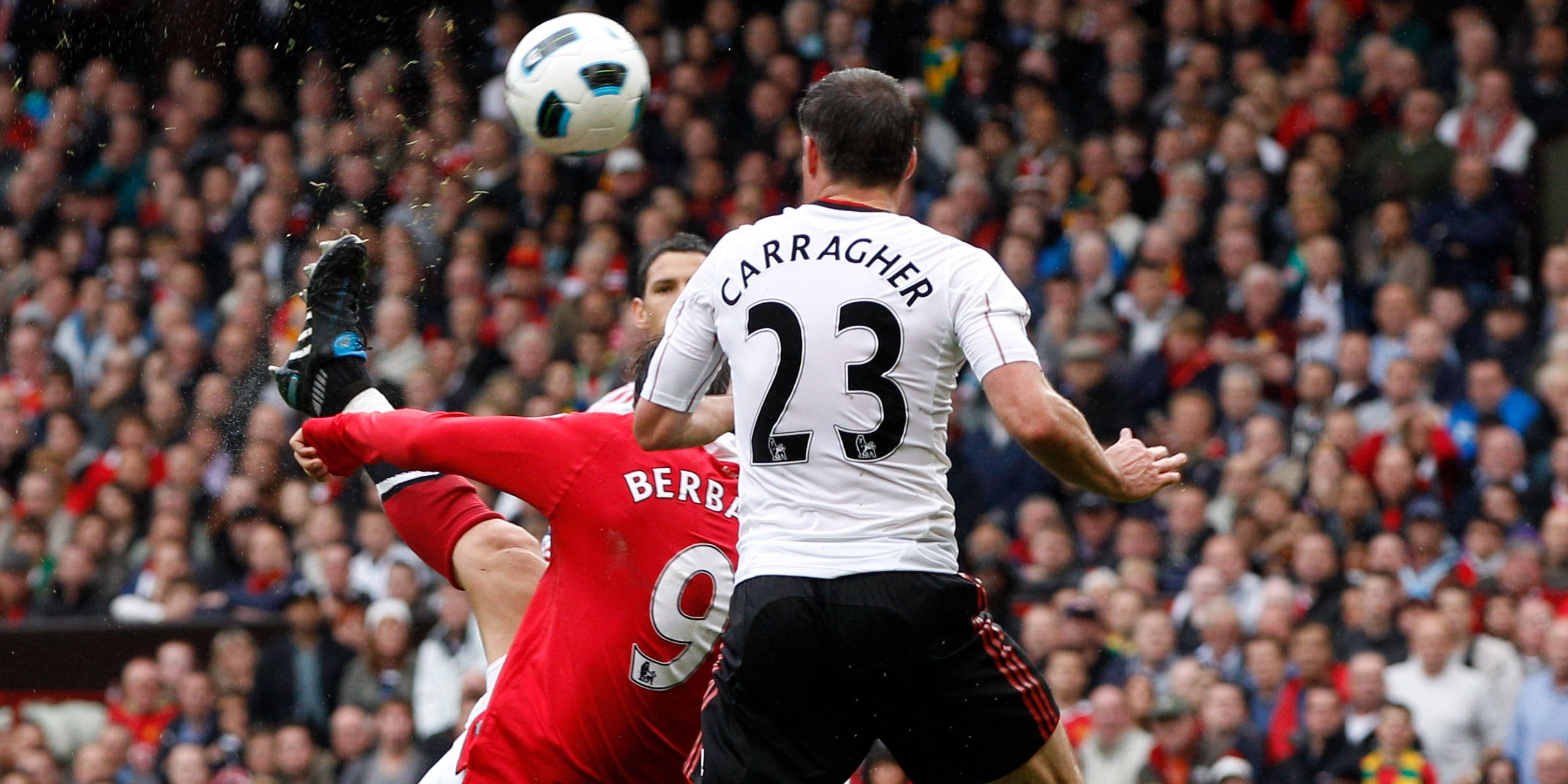 Manchester United's Dimitar Berbatov scores an overhead kick beyond Liverpool's Jamie Carragher. 