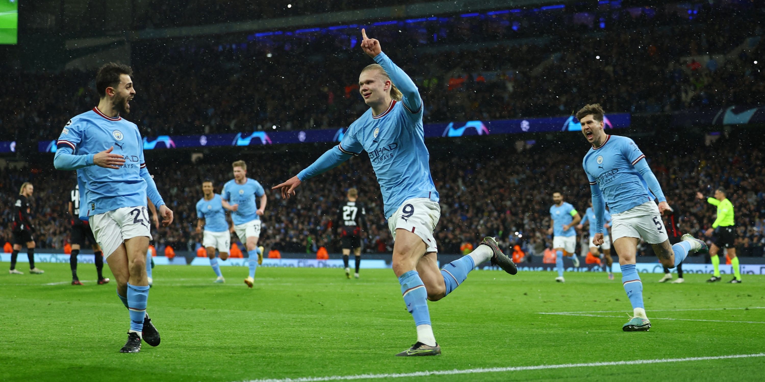 Manchester City's Erling Haaland celebrates with his teammates after scoring against Leipzig. 