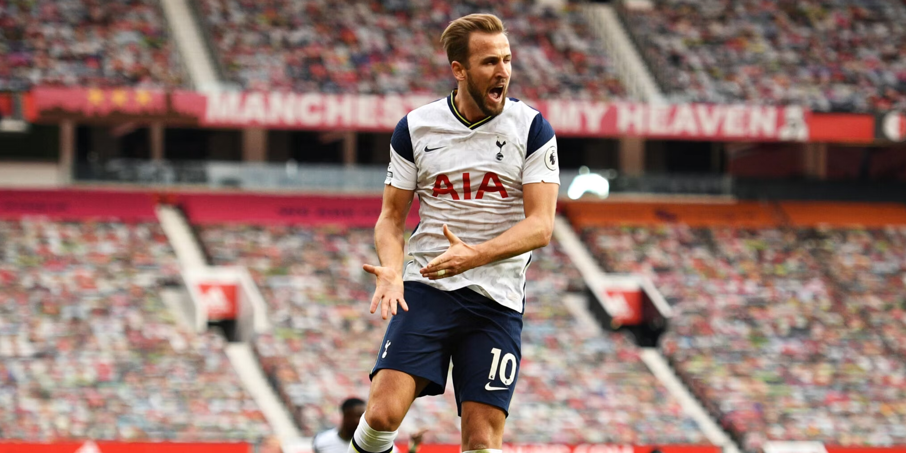 Harry Kane celebrating a goal at Old Trafford