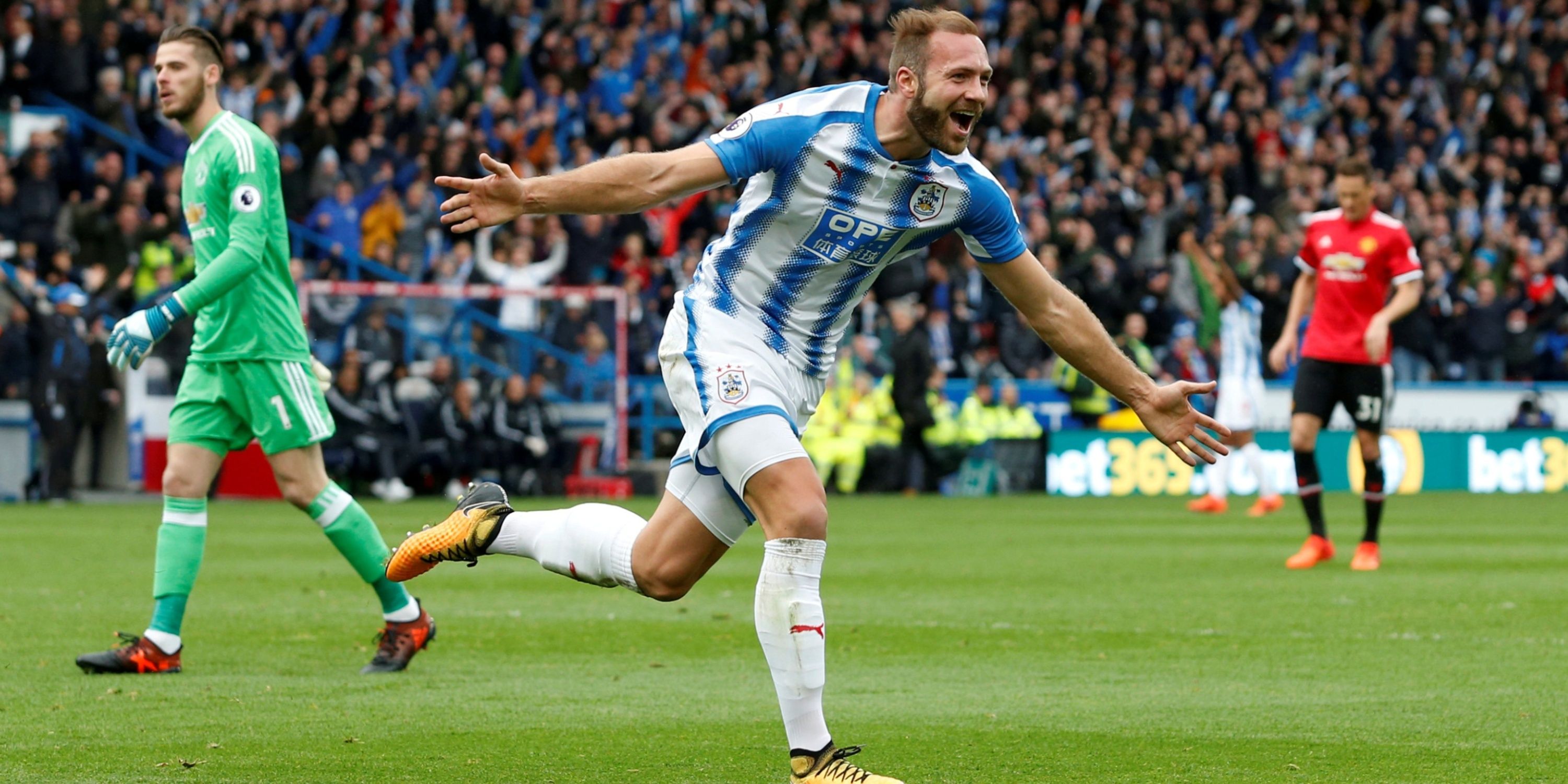 Huddersfield Town's Laurent Depoitre celebrates scoring against Manchester United.